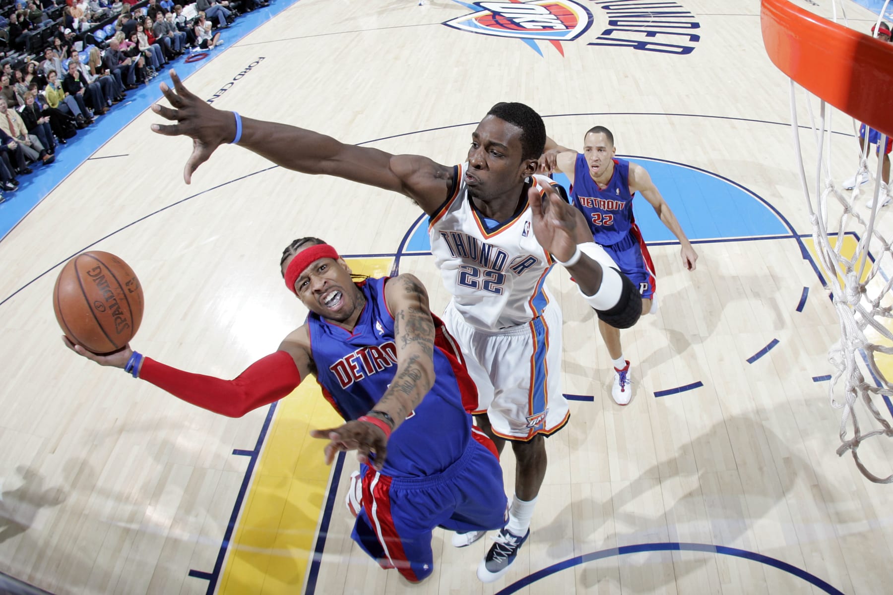 OKLAHOMA CITY - JANUARY 16:  Allen Iverson #1 of the Detroit Pistons shoots against Jeff Green #22 of the Oklahoma City Thunder on January 16, 2009 at the Ford Center in Oklahoma City, Oklahoma. NOTE TO USER: User expressly acknowledges and agrees that, by downloading and or using this Photograph, user is consenting to the terms and conditions of the Getty Images License Agreement. Mandatory Copyright Notice: Copyright 2009 NBAE (Photo by Layne Murdoch/NBAE via Getty Images)