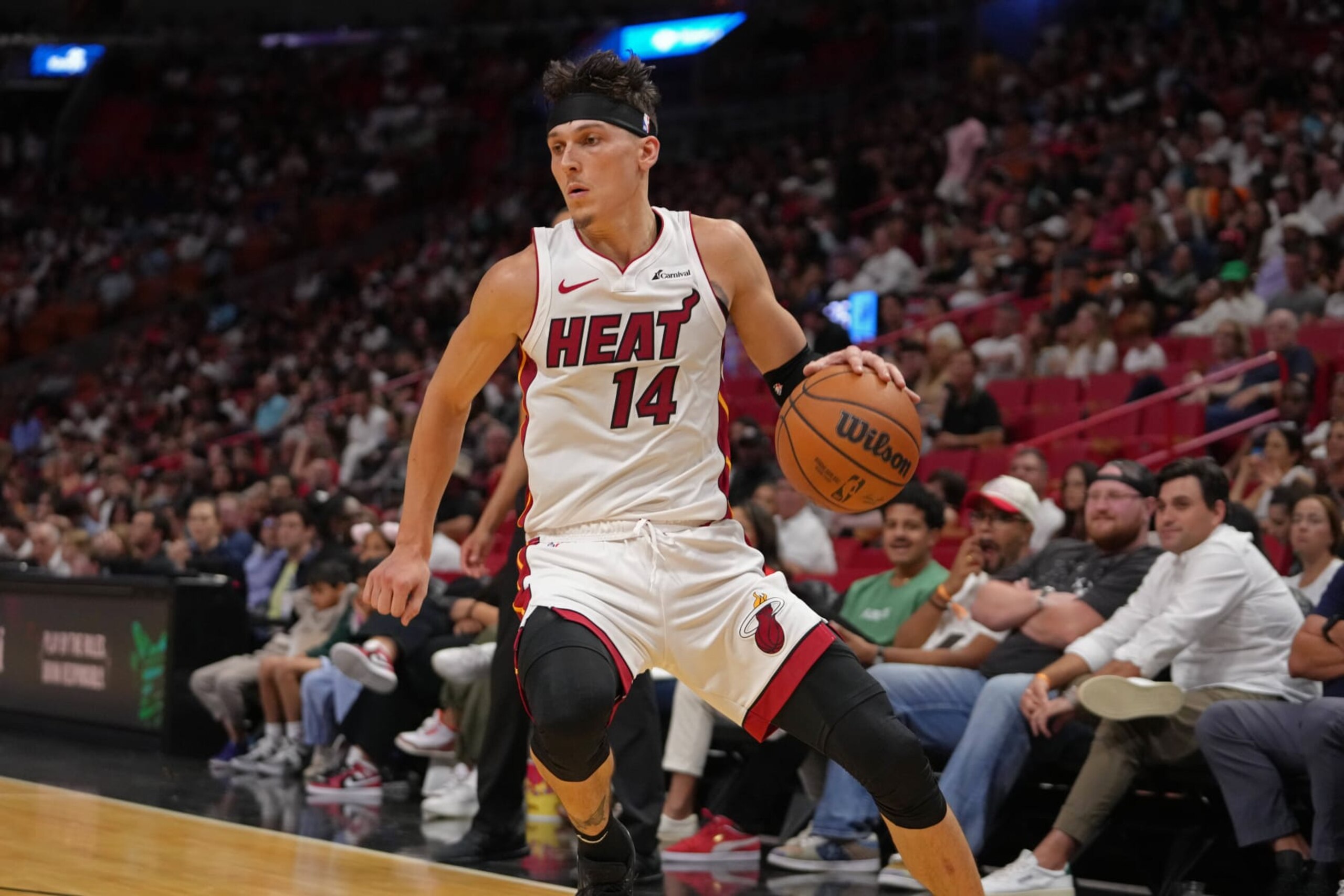 MIAMI, FL - OCTOBER 15: Tyler Herro #14 of the Miami Heat drives to the basket during the game against the Memphis Grizzlies on October 15, 2023 at Kaseya Center in Miami, Florida. NOTE TO USER: User expressly acknowledges and agrees that, by downloading and or using this Photograph, user is consenting to the terms and conditions of the Getty Images License Agreement. Mandatory Copyright Notice: Copyright 2023 NBAE (Photo by Eric Espada/NBAE via Getty Images)