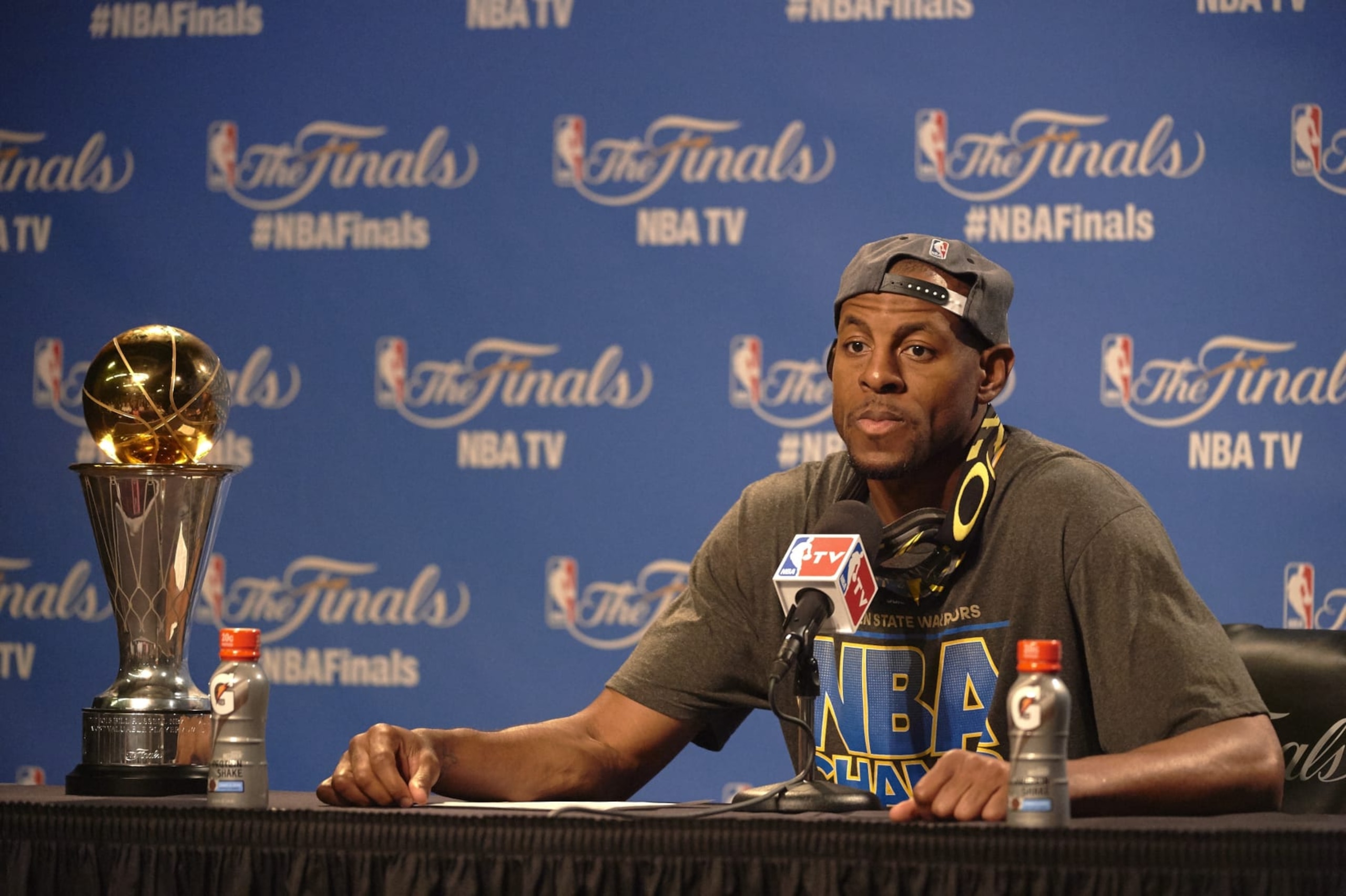 Basketball: NBA Finals: Golden State Warriors Andre Iguodala with Bill Russell NBA Finals MVP Trophy during press conference after winning Game 6 and championship series vs Cleveland Cavaliers at Quicken Loans Arena. 
Cleveland, OH 6/16/2015
CREDIT: John W. McDonough (Photo by John W. McDonough /Sports Illustrated via Getty Images)
(Set Number: X159718 TK1 )