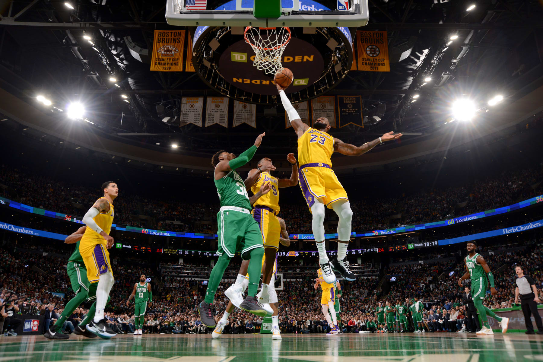 BOSTON, MA - FEBRUARY 7: LeBron James #23 of the Los Angeles Lakers rebounds the ball against the Boston Celtics on February 7, 2019 at the TD Garden in Boston, Massachusetts. NOTE TO USER: User expressly acknowledges and agrees that, by downloading and/or using this photograph, user is consenting to the terms and conditions of the Getty Images License Agreement. Mandatory Copyright Notice: Copyright 2019 NBAE (Photo by Brian Babineau/NBAE via Getty Images)