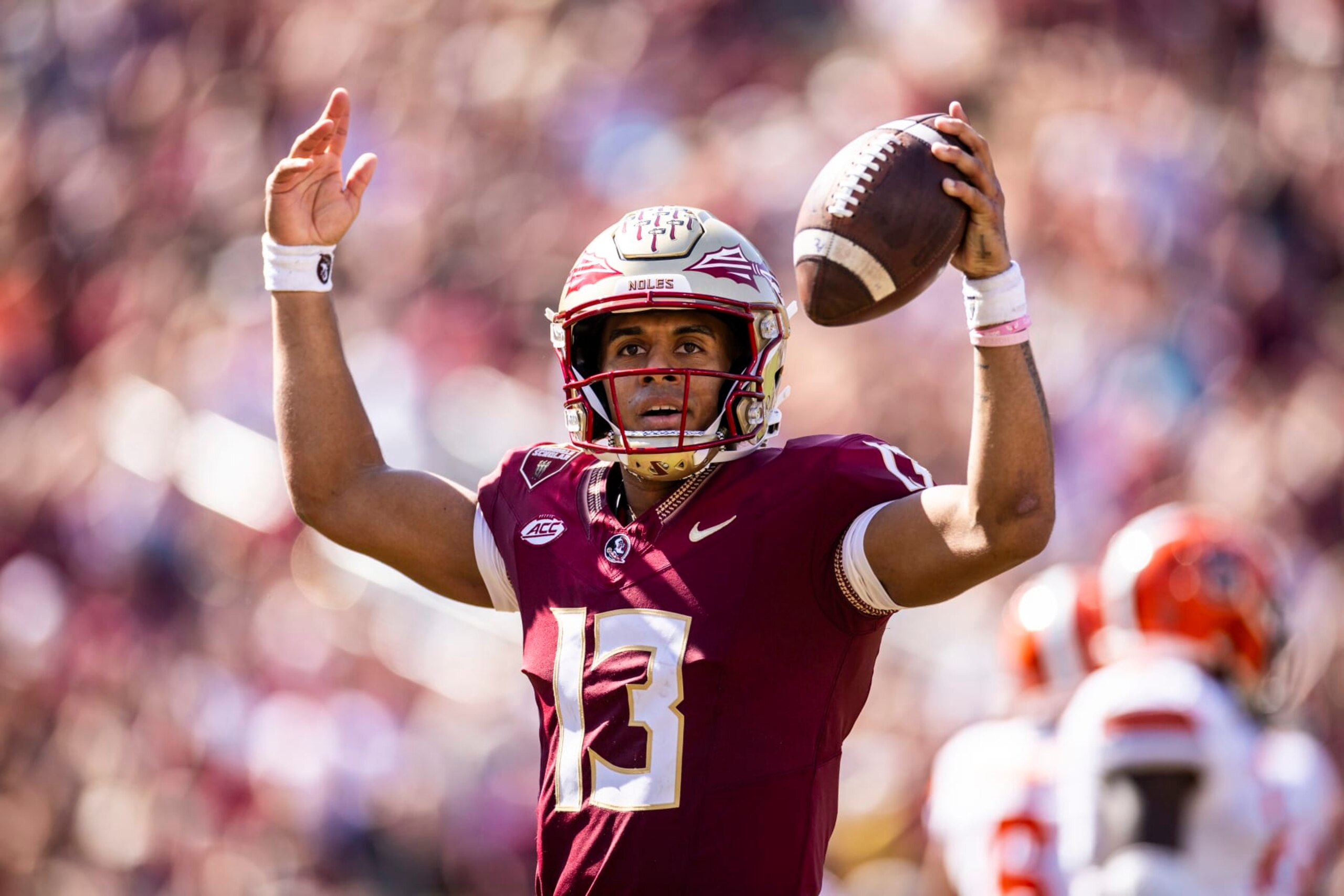 TALLAHASSEE, FLORIDA - OCTOBER 14: Jordan Travis #13 of the Florida State Seminoles celebrates after scoring a touchdown during the second half of a game against the Syracuse Orange at Doak Campbell Stadium on October 14, 2023 in Tallahassee, Florida. (Photo by James Gilbert/Getty Images)