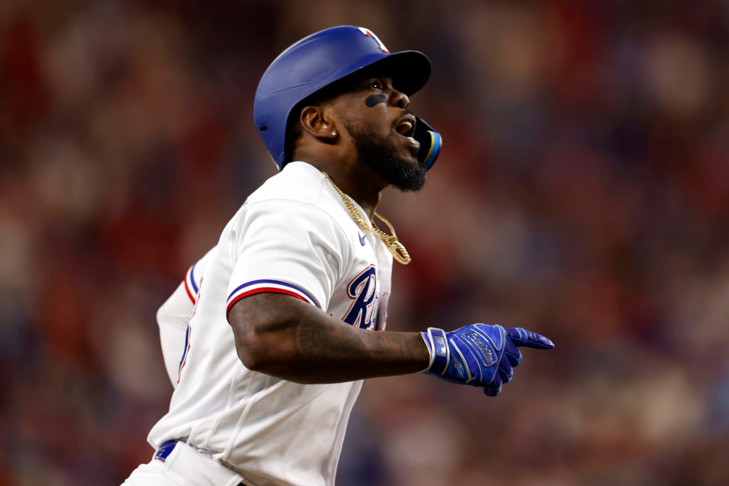 ARLINGTON, TX - OCTOBER 20: Adolis García #53 of the Texas Rangers rounds the bases after hitting a three-run home run in the sixth inning during Game 5 of the ALCS between the Houston Astros and the Texas Rangers at Globe Life Field on Friday, October 20, 2023 in Arlington, Texas. (Photo by Ron Jenkins/MLB Photos via Getty Images) ARLINGTON, TX - OCTOBER 20: Adolis García #53 of the Texas Rangers rounds the bases after hitting a three-run home run in the sixth inning during Game 5 of the ALCS between the Houston Astros and the Texas Rangers at Globe Life Field on Friday, October 20, 2023 in Arlington, Texas. (Photo by Ron Jenkins/MLB Photos via Getty Images)