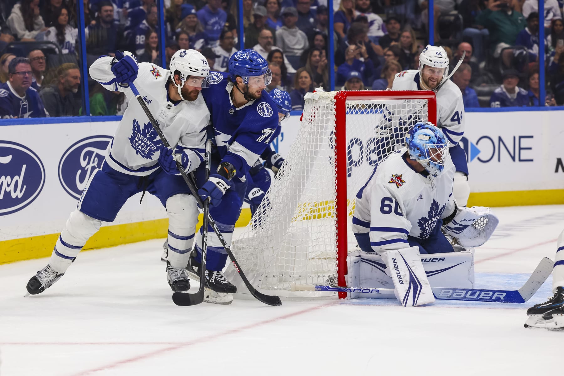 TAMPA, FL - OCTOBER 21: Anthony Cirelli #71 of the Tampa Bay Lightning against TJ Brodie #78 of the Toronto Maple Leafs during the second period at Amalie Arena on October 21, 2023 in Tampa, Florida. (Photo by Mark LoMoglio/NHLI via Getty Images)