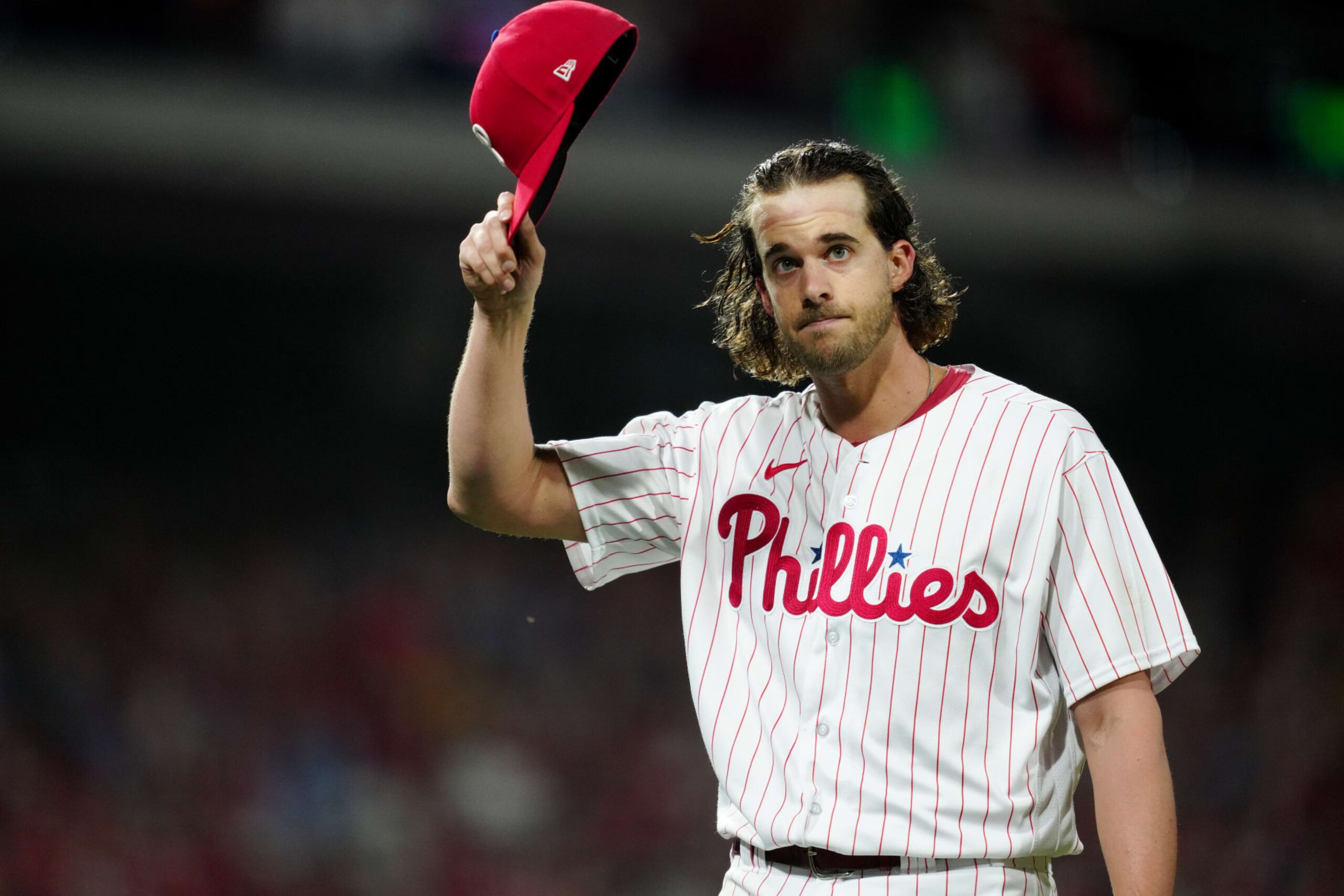 PHILADELPHIA, PA - OCTOBER 11:  Aaron Nola #27 of the Philadelphia Phillies acknowledges the crowd as he walks back to the dugout during a pitching change during Game 3 of the Division Series between the Atlanta Braves and the Philadelphia Phillies at Citizens Bank Park on Wednesday, October 11, 2023 in Philadelphia, Pennsylvania. (Photo by Mary DeCicco/MLB Photos via Getty Images)