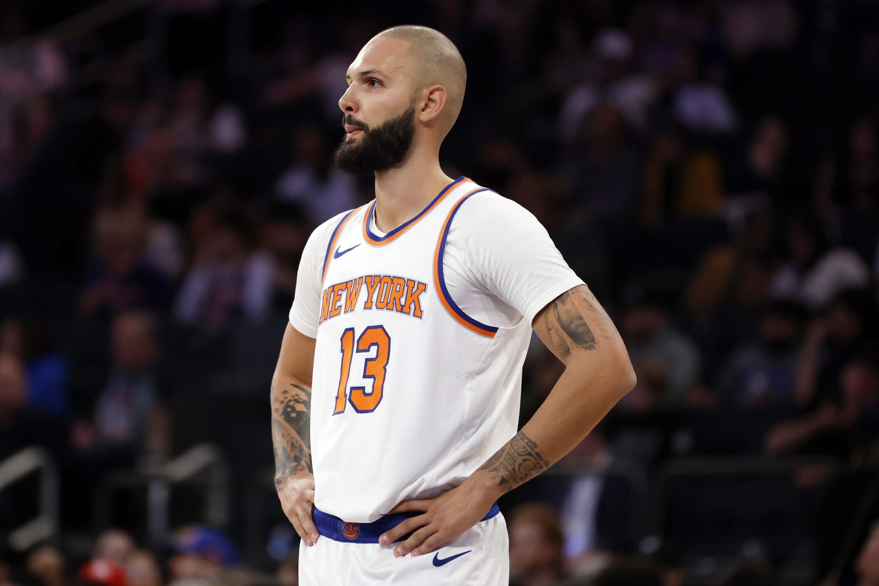 NEW YORK, NEW YORK - OCTOBER 09: Evan Fournier #13 of the New York Knicks looks on during the first half of a preseason game against the Boston Celtics at Madison Square Garden on October 09, 2023 in New York City. NOTE TO USER: User expressly acknowledges and agrees that, by downloading and or using this photograph, User is consenting to the terms and conditions of the Getty Images License Agreement. (Photo by Sarah Stier/Getty Images)