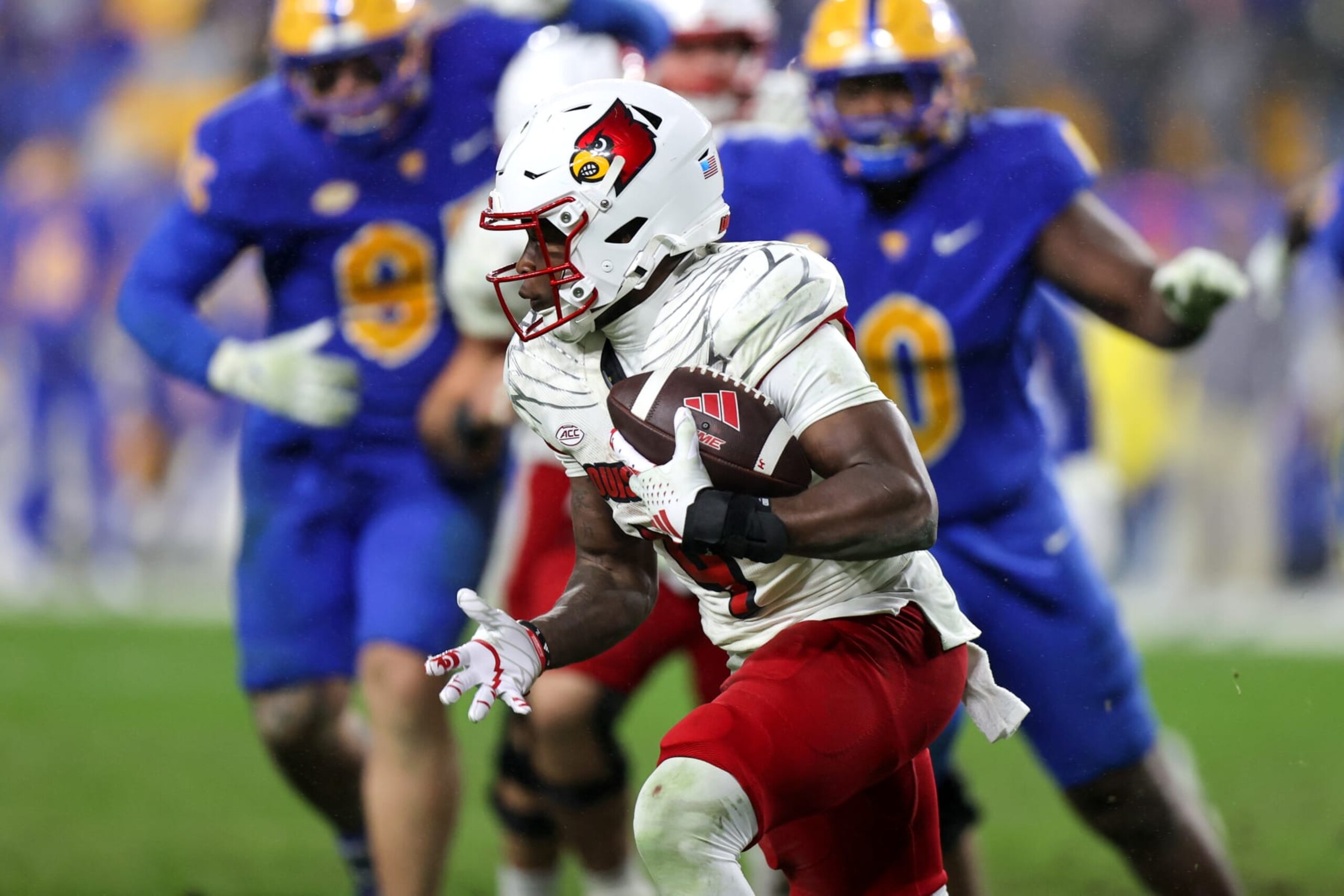 PITTSBURGH, PA - OCTOBER 14: Louisville Cardinals running back Maurice Turner (4) carries the football during the third quarter of the college football game between the Louisville Cardinals and Pitt Panthers on October 14, 2023, at Acrisure Stadium in Pittsburgh, PA. (Photo by Frank Jansky/Icon Sportswire via Getty Images)