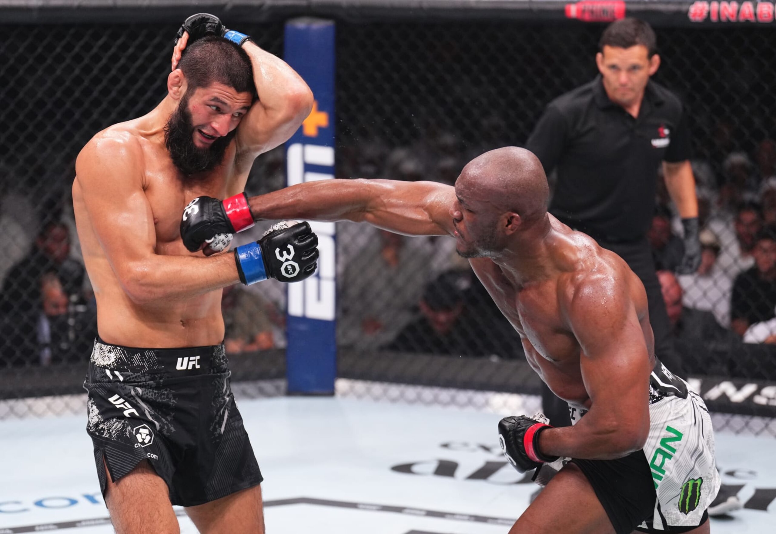 ABU DHABI, UNITED ARAB EMIRATES - OCTOBER 21: (R-L) Kamaru Usman of Nigeria punches Khamzat Chimaev of the United Arab Emirates in a middleweight fight during the UFC 294 event at Etihad Arena on October 21, 2023 in Abu Dhabi, United Arab Emirates. (Photo by Chris Unger/Zuffa LLC via Getty Images)