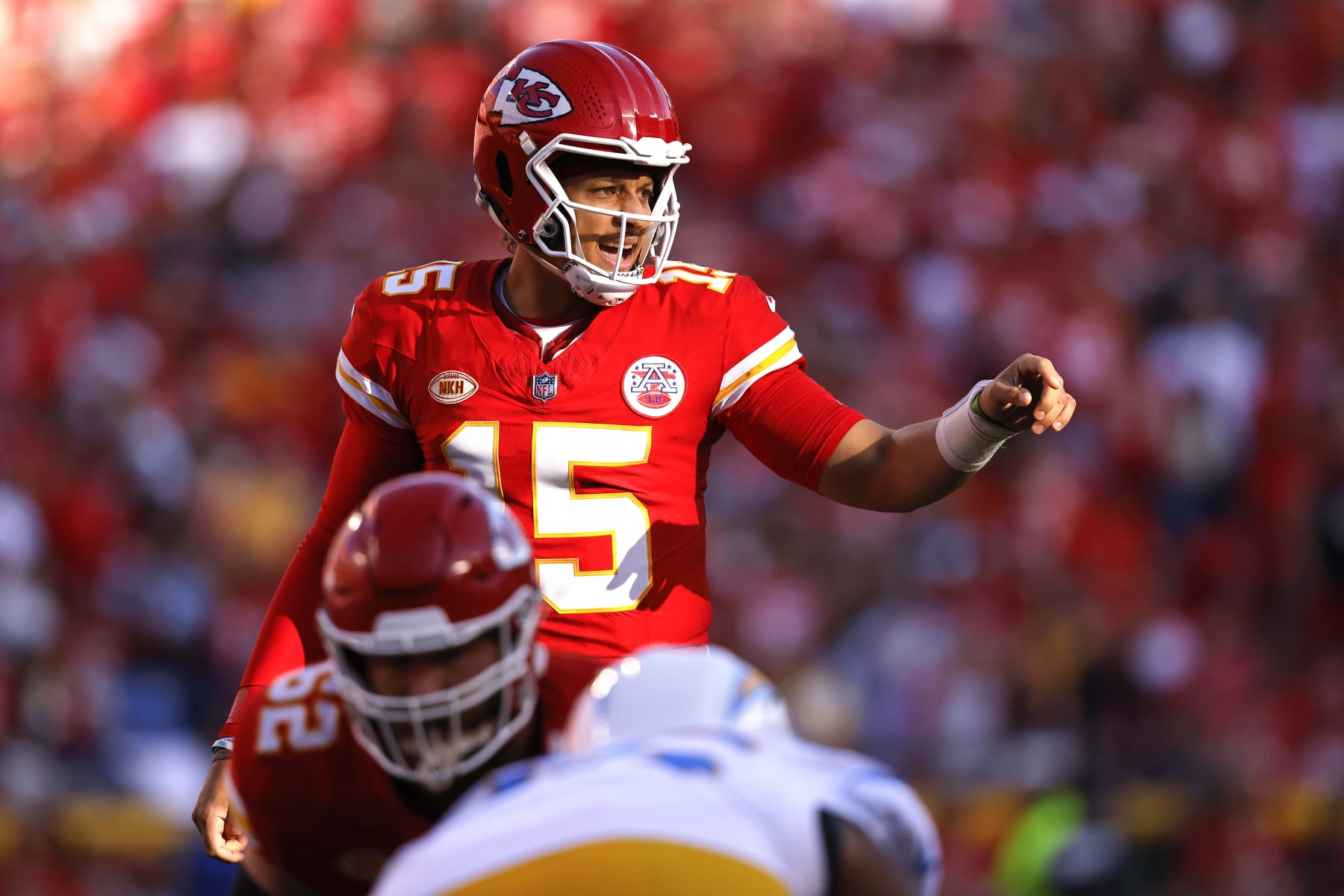 KANSAS CITY, MISSOURI - OCTOBER 22: Patrick Mahomes #15 of the Kansas City Chiefs calls a play during the second quarter against the Los Angeles Chargers at GEHA Field at Arrowhead Stadium on October 22, 2023 in Kansas City, Missouri. (Photo by David Eulitt/Getty Images)