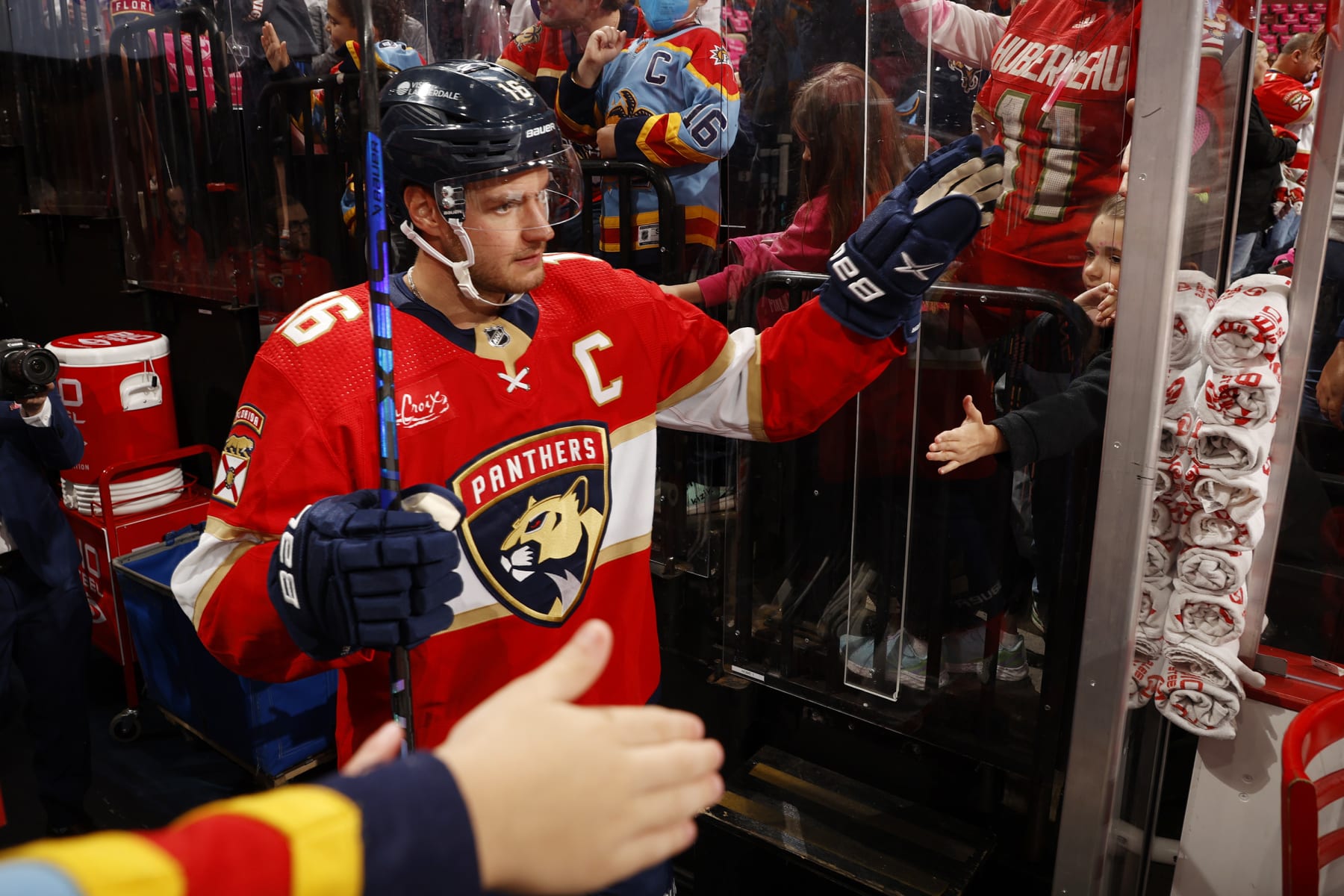 SUNRISE, FLORIDA - OCTOBER 21: Aleksander Barkov #16 of the Florida Panthers is greeted by fans on his way to the ice prior to the start of the game against the Vancouver Canucks at the Amerant Bank Arena on October 21, 2023 in Sunrise, Florida. (Photo by Eliot J. Schechter/NHLI via Getty Images) SUNRISE, FLORIDA - OCTOBER 21: Aleksander Barkov #16 of the Florida Panthers is greeted by fans on his way to the ice prior to the start of the game against the Vancouver Canucks at the Amerant Bank Arena on October 21, 2023 in Sunrise, Florida. (Photo by Eliot J. Schechter/NHLI via Getty Images)