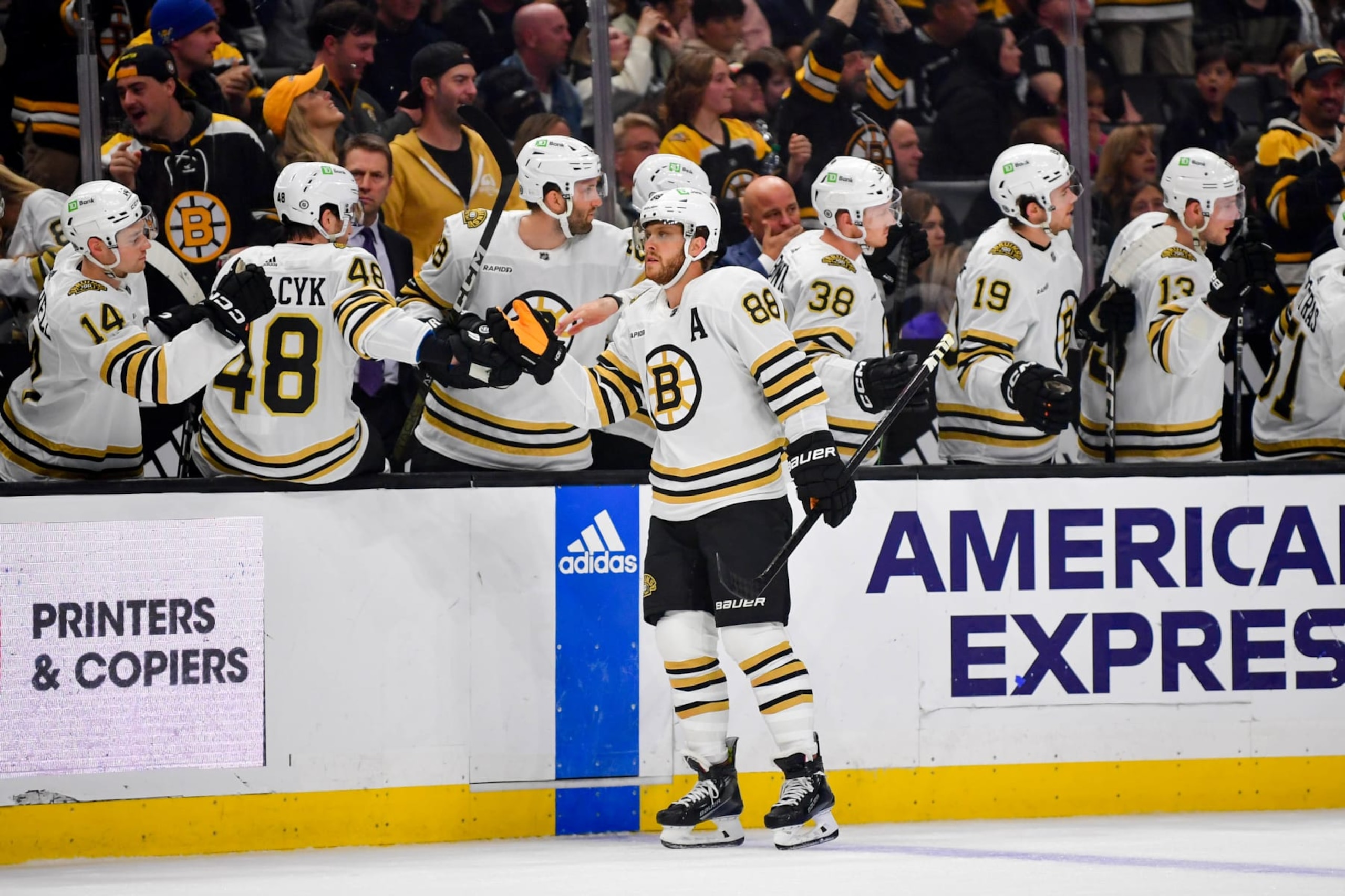 LOS ANGELES, CA - OCTOBER 21: David Pastrnak #88 of the Boston Bruins celebrates his goal with teammates during the first period against the Los Angeles Kings at Crypto.com Arena on October 21, 2023 in Los Angeles, California. (Photo by Gary A. Vasquez/NHLI via Getty Images)