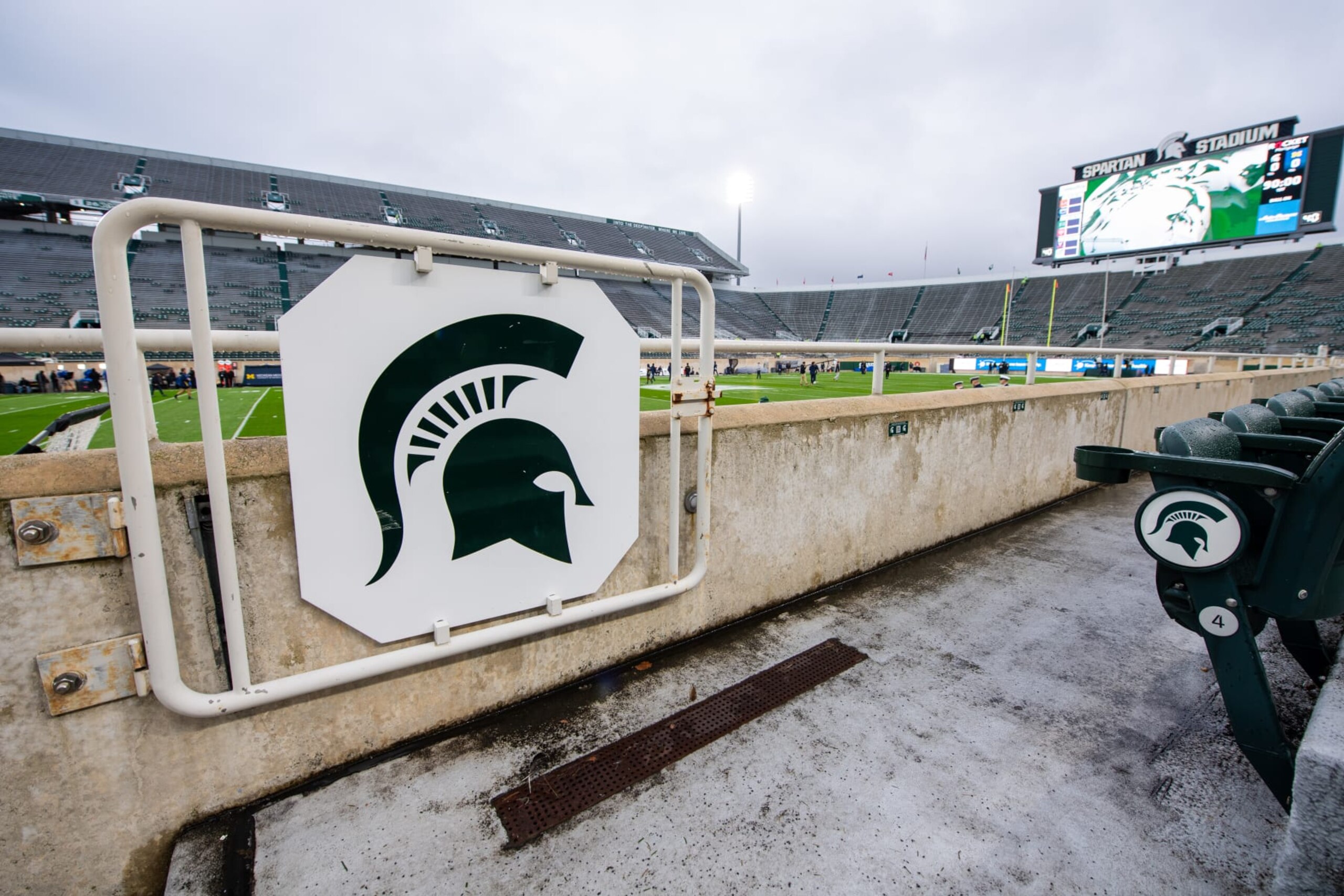 EAST LANSING, MICHIGAN - OCTOBER 21: A general view of the gate with the Spartan logo before a college football game between the Michigan Wolverines and the Michigan State Spartans at Spartan Stadium on October 21, 2023 in East Lansing, Michigan. (Photo by Aaron J. Thornton/Getty Images)