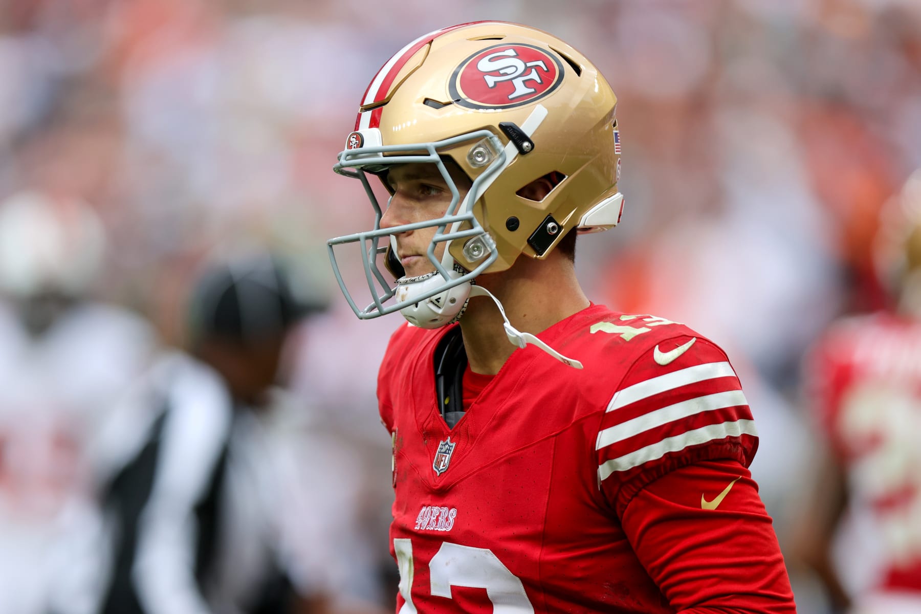 CLEVELAND, OH - OCTOBER 15: San Francisco 49ers quarterback Brock Purdy (13) walks to the sideline during the fourth quarter of the National Football League game between the San Francisco 49ers and Cleveland Browns on October 15, 2023, at Cleveland Browns Stadium in Cleveland, OH. (Photo by Frank Jansky/Icon Sportswire via Getty Images)