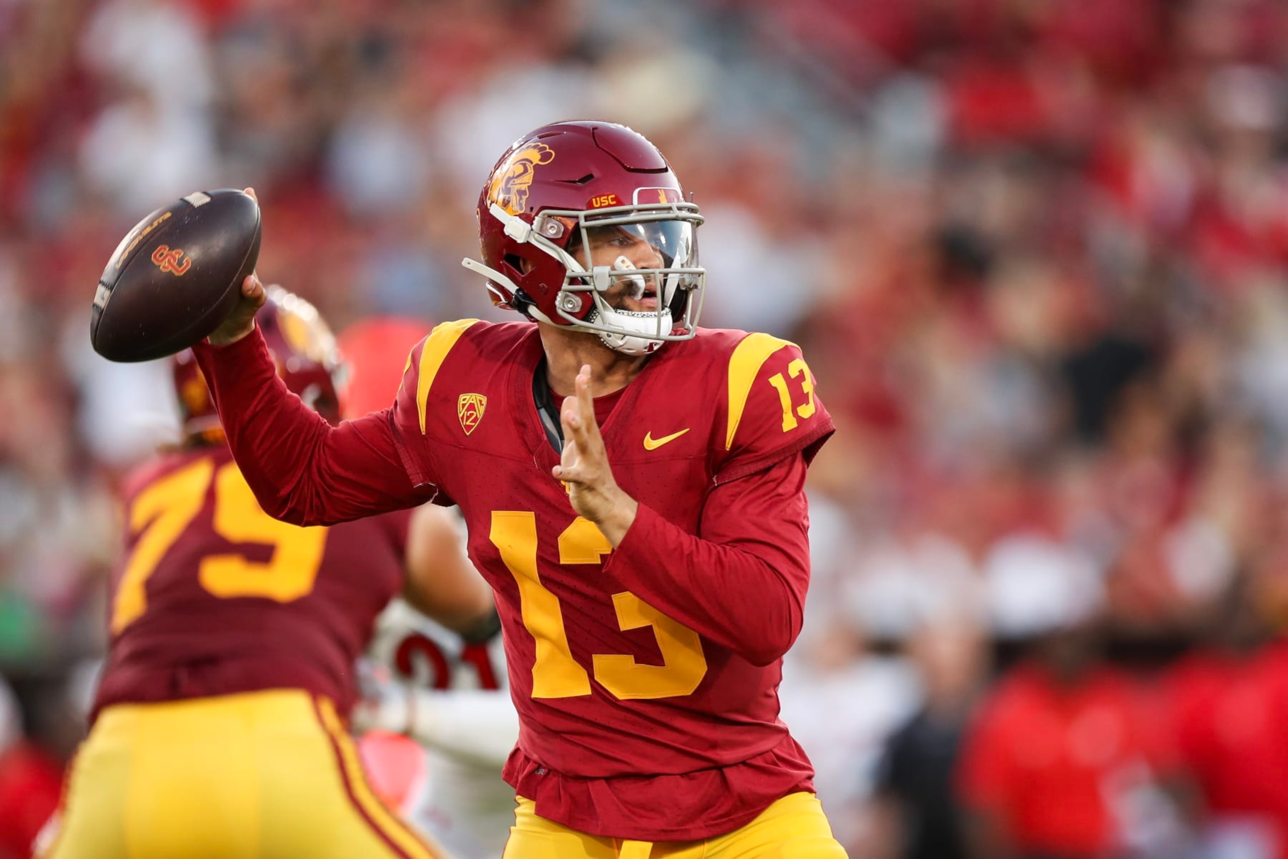 LOS ANGELES, CALIFORNIA - OCTOBER 21: Caleb Williams #13 of the USC Trojans throws a pass in the first quarter against the Utah Utes at United Airlines Field at the Los Angeles Memorial Coliseum on October 21, 2023 in Los Angeles, California. (Photo by Meg Oliphant/Getty Images)
