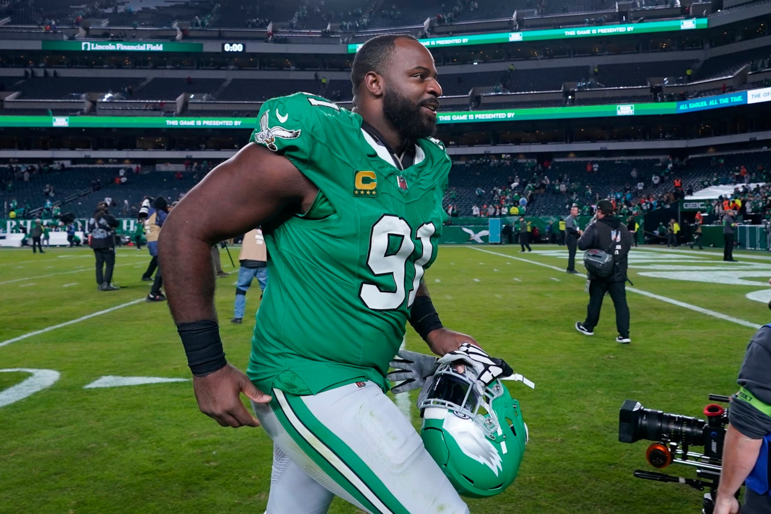 Philadelphia Eagles defensive tackle Fletcher Cox (91) leaves the field after an NFL football game against the Miami Dolphins on Sunday, Oct. 22, 2023, in Philadelphia. (AP Photo/Matt Slocum)