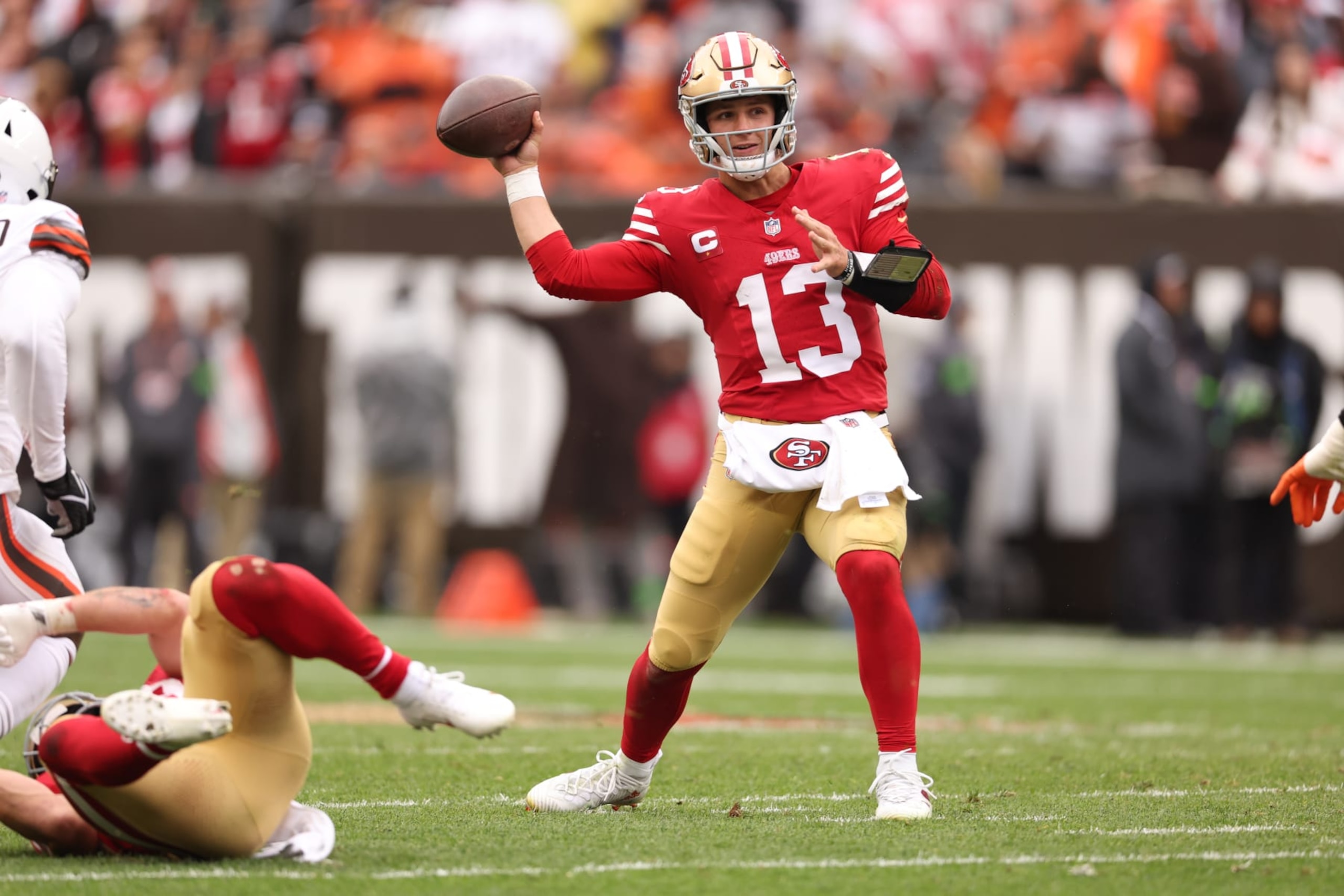 CLEVELAND, OHIO - OCTOBER 15: Brock Purdy #13 of the San Francisco 49ers attempts a pass during the second quarter against the Cleveland Browns at Cleveland Browns Stadium on October 15, 2023 in Cleveland, Ohio. (Photo by Gregory Shamus/Getty Images)