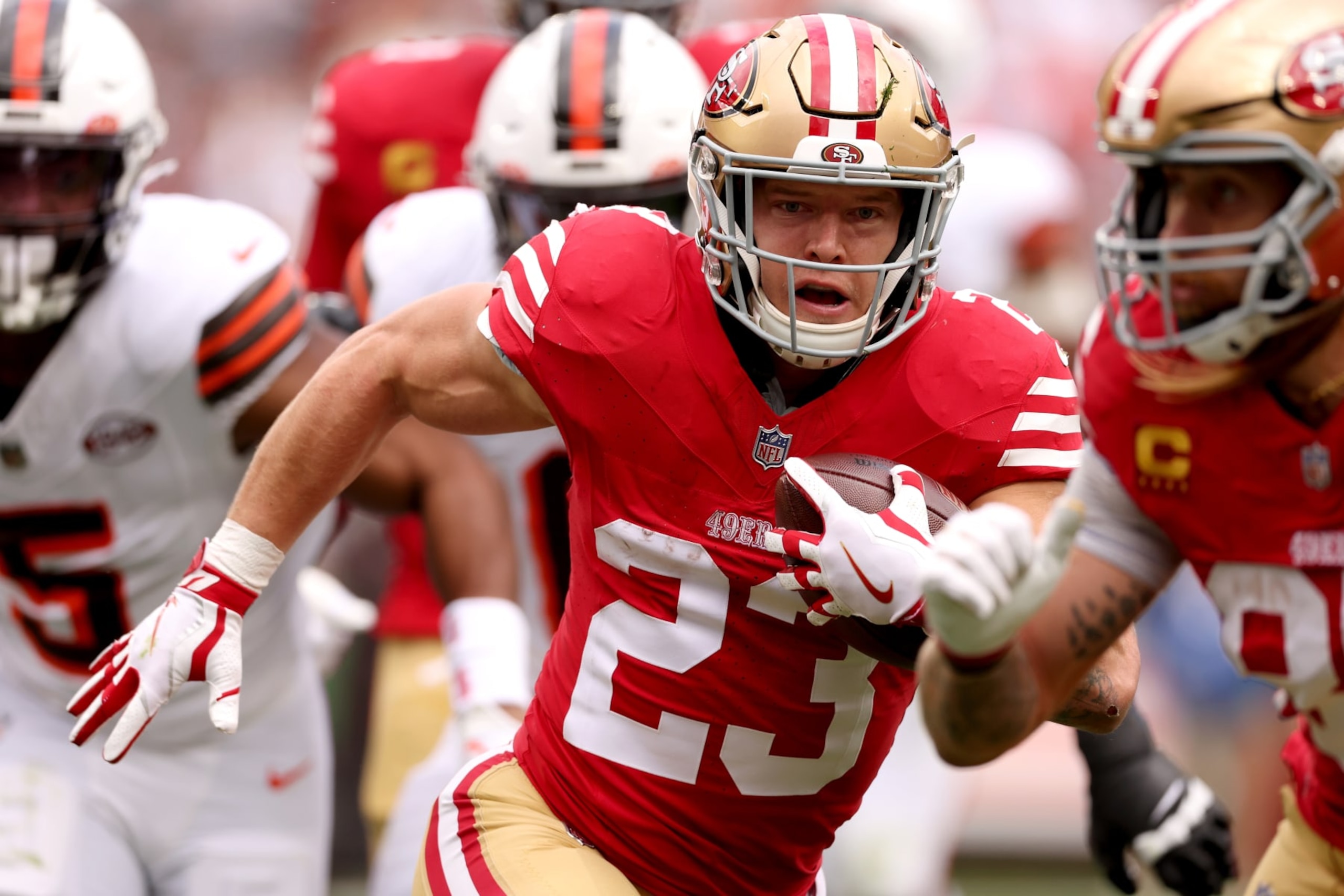 CLEVELAND, OHIO - OCTOBER 15: Christian McCaffrey #23 of the San Francisco 49ers runs for a touchdown after a catch during the first quarter against the Cleveland Browns at Cleveland Browns Stadium on October 15, 2023 in Cleveland, Ohio. (Photo by Gregory Shamus/Getty Images)