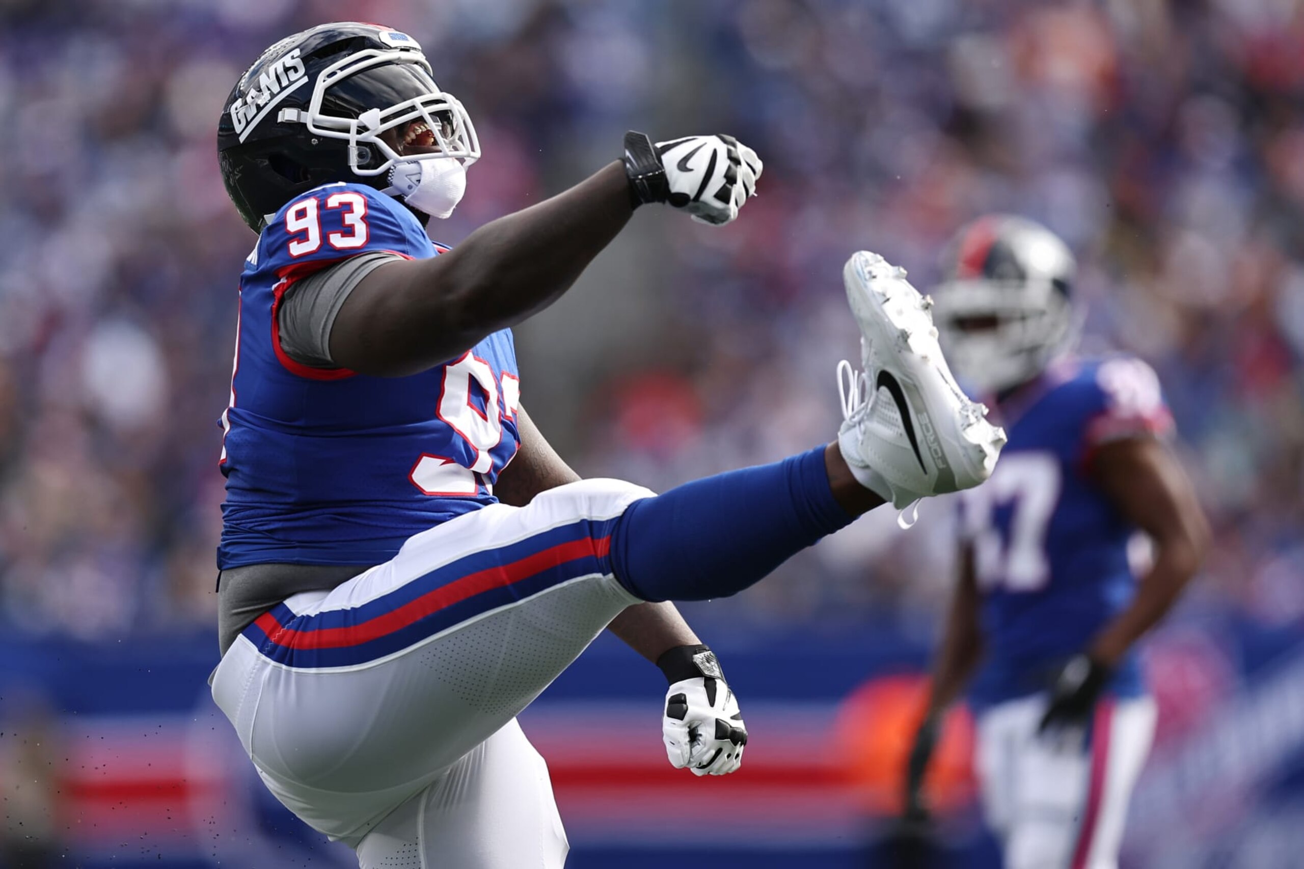 EAST RUTHERFORD, NEW JERSEY - OCTOBER 22: Rakeem Nunez-Roches #93 of the New York Giants celebrates after a tackle in the second quarter of the game against the Washington Commanders at MetLife Stadium on October 22, 2023 in East Rutherford, New Jersey. (Photo by Dustin Satloff/Getty Images)