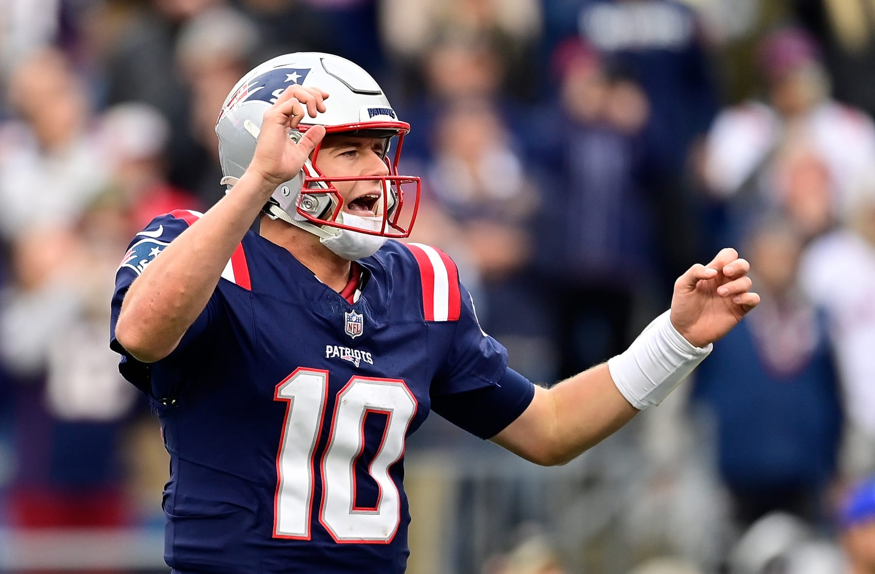 FOXBOROUGH, MASSACHUSETTS - OCTOBER 22: Mac Jones #10 of the New England Patriots reacts after a play in the fourth quarter of the game against the Buffalo Bills at Gillette Stadium on October 22, 2023 in Foxborough, Massachusetts. (Photo by Billie Weiss/Getty Images)