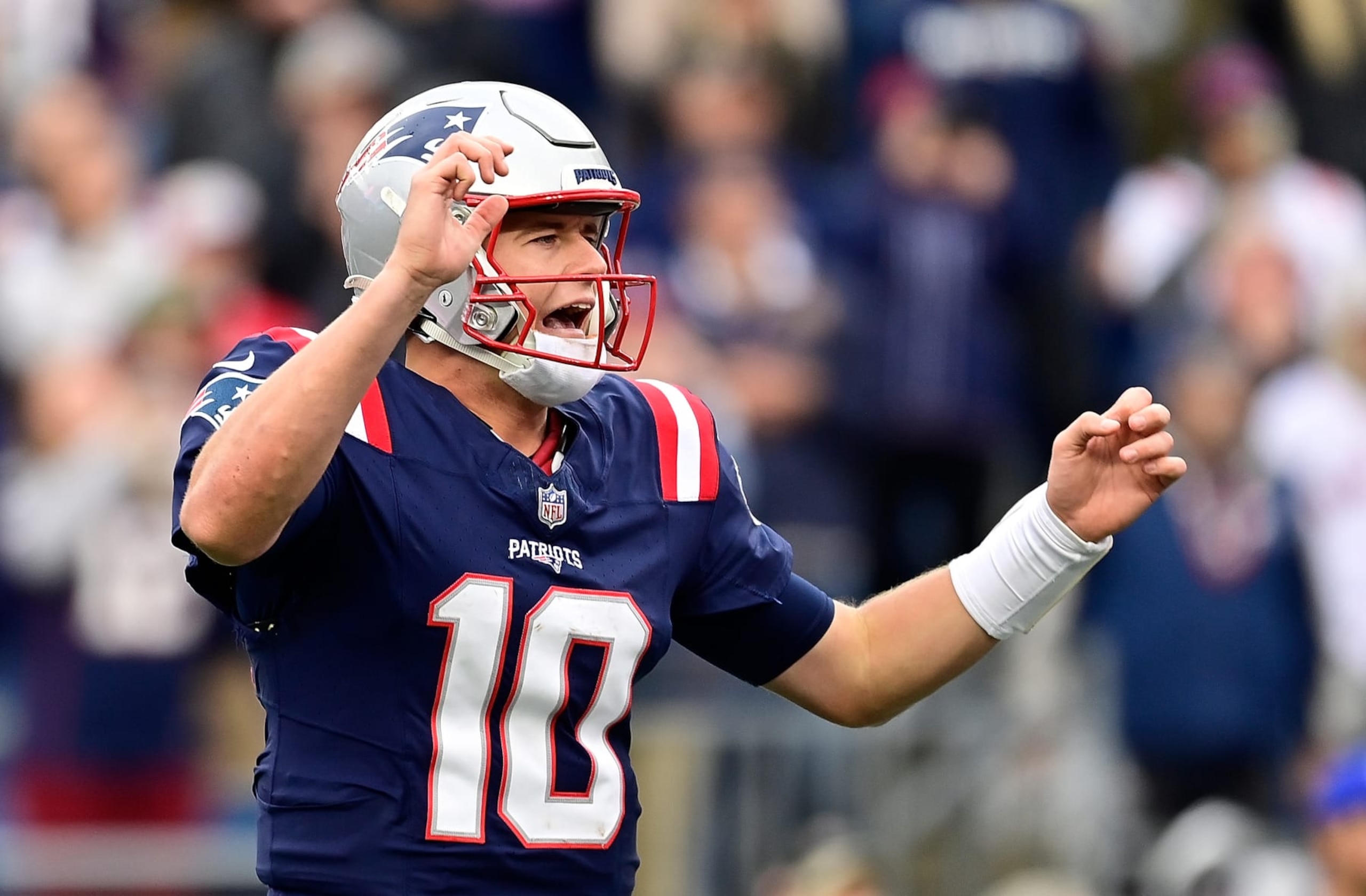 FOXBOROUGH, MASSACHUSETTS - OCTOBER 22: Mac Jones #10 of the New England Patriots reacts after a play in the fourth quarter of the game against the Buffalo Bills at Gillette Stadium on October 22, 2023 in Foxborough, Massachusetts. (Photo by Billie Weiss/Getty Images) FOXBOROUGH, MASSACHUSETTS - OCTOBER 22: Mac Jones #10 of the New England Patriots reacts after a play in the fourth quarter of the game against the Buffalo Bills at Gillette Stadium on October 22, 2023 in Foxborough, Massachusetts. (Photo by Billie Weiss/Getty Images)
