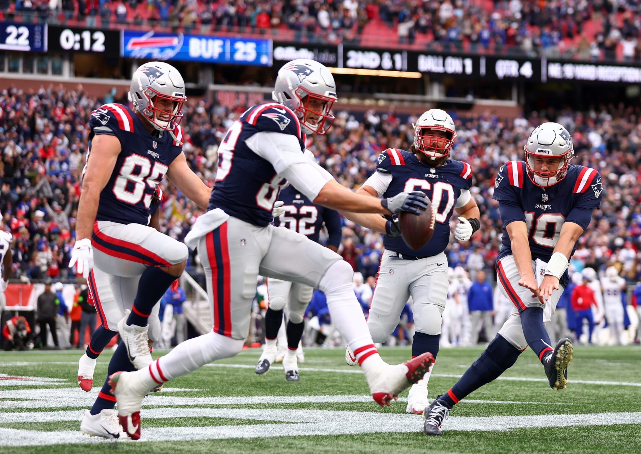 FOXBOROUGH, MASSACHUSETTS - OCTOBER 22: Mike Gesicki #88 of the New England Patriots celebrates with Mac Jones #10 after scoring a touchdown in the fourth quarter of the game against the Buffalo Bills at Gillette Stadium on October 22, 2023 in Foxborough, Massachusetts. (Photo by Maddie Meyer/Getty Images) FOXBOROUGH, MASSACHUSETTS - OCTOBER 22: Mike Gesicki #88 of the New England Patriots celebrates with Mac Jones #10 after scoring a touchdown in the fourth quarter of the game against the Buffalo Bills at Gillette Stadium on October 22, 2023 in Foxborough, Massachusetts. (Photo by Maddie Meyer/Getty Images)