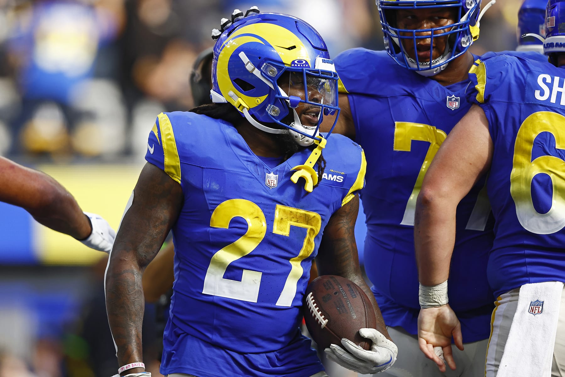 INGLEWOOD, CALIFORNIA - OCTOBER 22: Darrell Henderson Jr. #27 of the Los Angeles Rams reacts to a touchdown during the third quarter against the Pittsburgh Steelers at SoFi Stadium on October 22, 2023 in Inglewood, California. (Photo by Ronald Martinez/Getty Images)