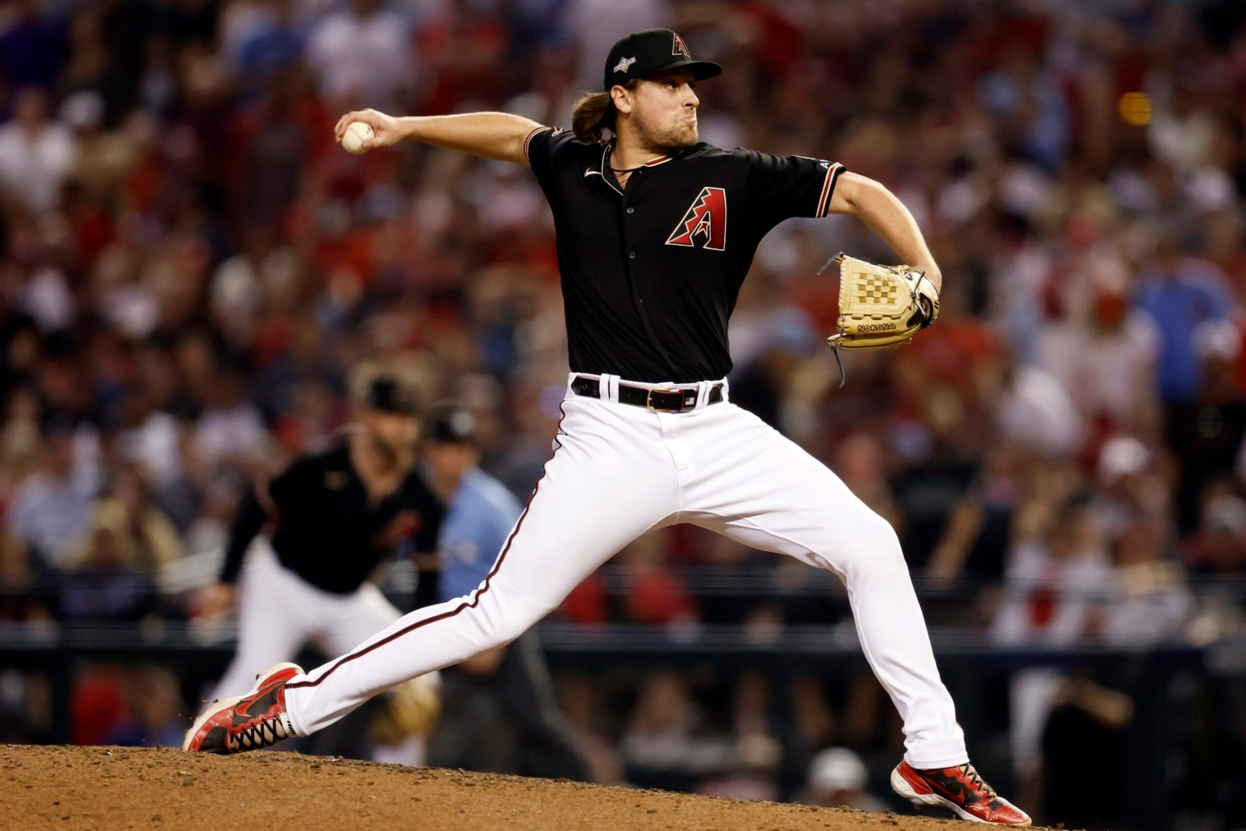 Arizona's Kevin Ginkel has a win and four holds in his 6.1 scoreless IP.