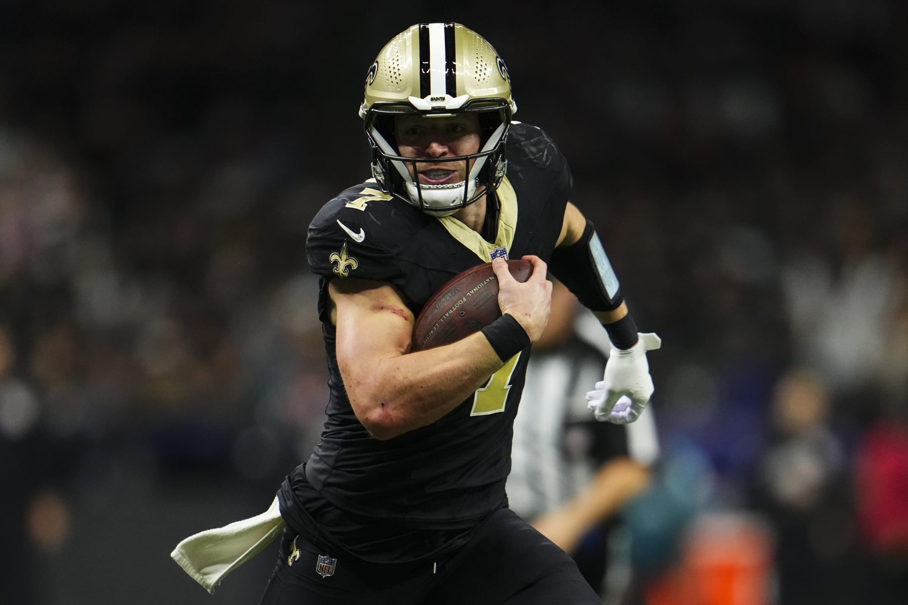 NEW ORLEANS, LA - OCTOBER 19: Taysom Hill #7 of the New Orleans Saints runs the ball during an NFL football game against the Jacksonville Jaguars at Caesars Superdome on October 19, 2023 in New Orleans, Louisiana. (Photo by Cooper Neill/Getty Images)
