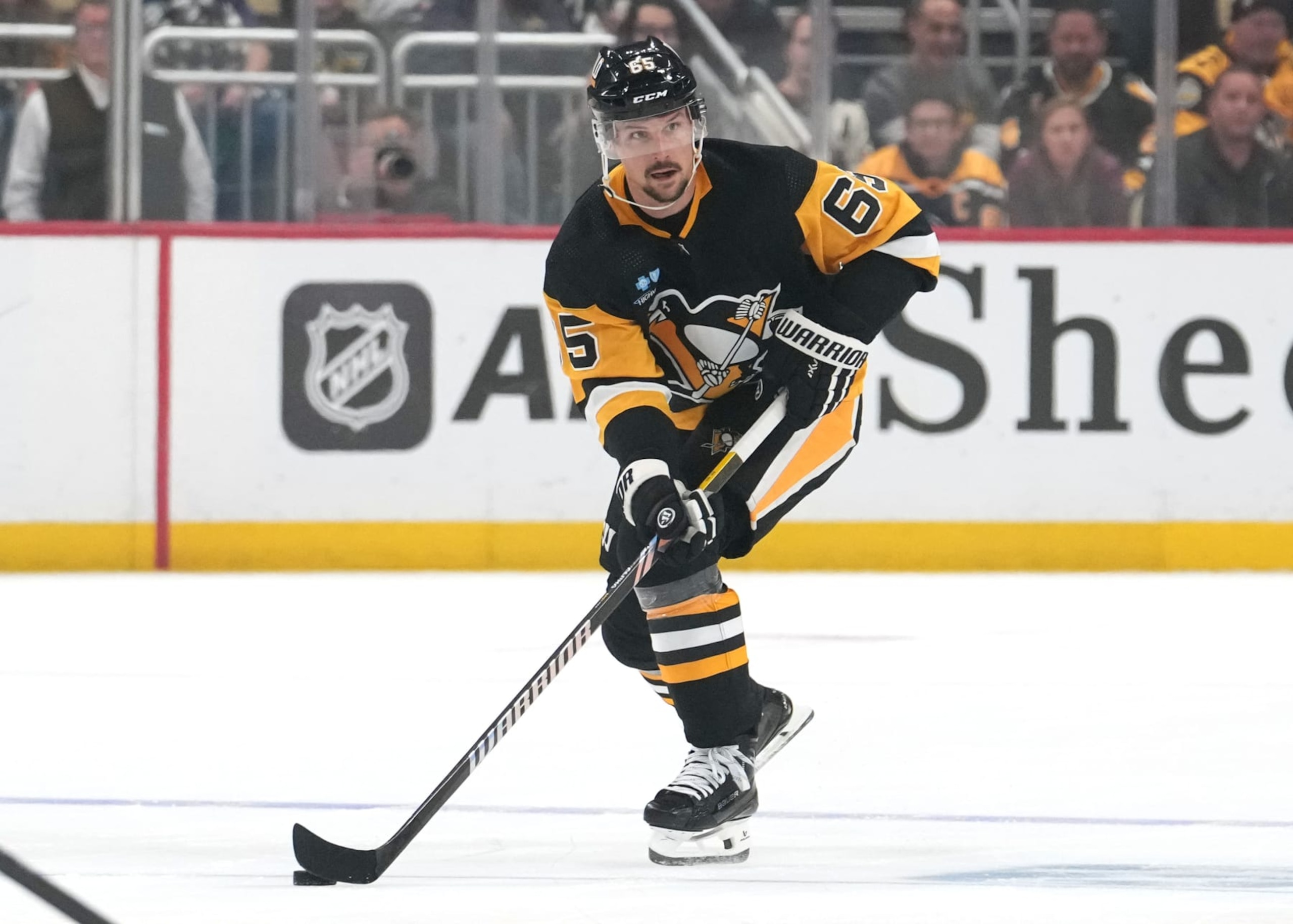 PITTSBURGH, PENNSYLVANIA - OCTOBER 14: Erik Karlsson #65 of the Pittsburgh Penguins skates during the first period against the Calgary Flames at PPG PAINTS Arena on October 14, 2023 in Pittsburgh, Pennsylvania. (Photo by Jason Mowry/Getty Images)