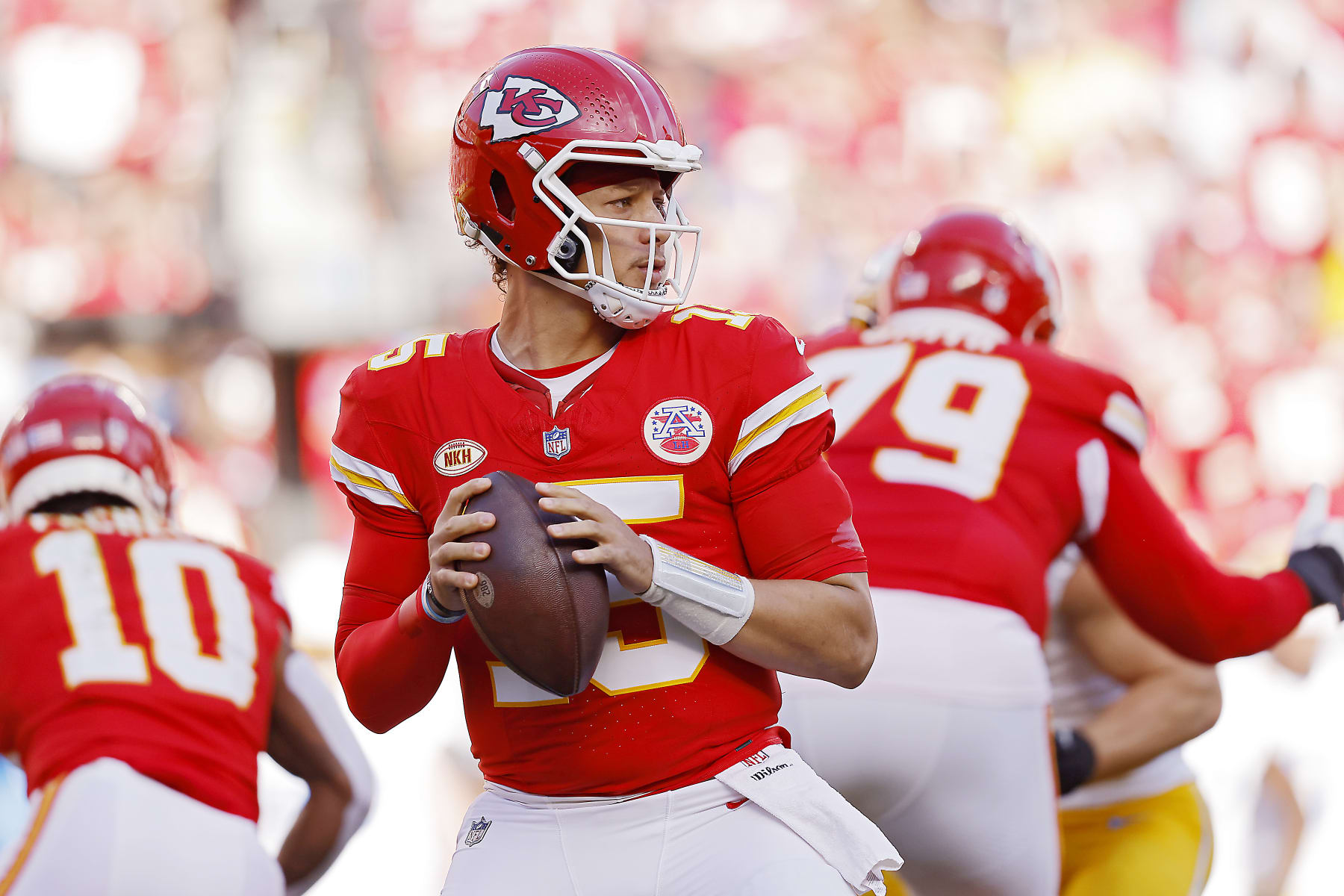 KANSAS CITY, MISSOURI - OCTOBER 22: Patrick Mahomes #15 of the Kansas City Chiefs looks to pass against the Los Angeles Chargers during the first half of the game at GEHA Field at Arrowhead Stadium on October 22, 2023 in Kansas City, Missouri. (Photo by David Eulitt/Getty Images)