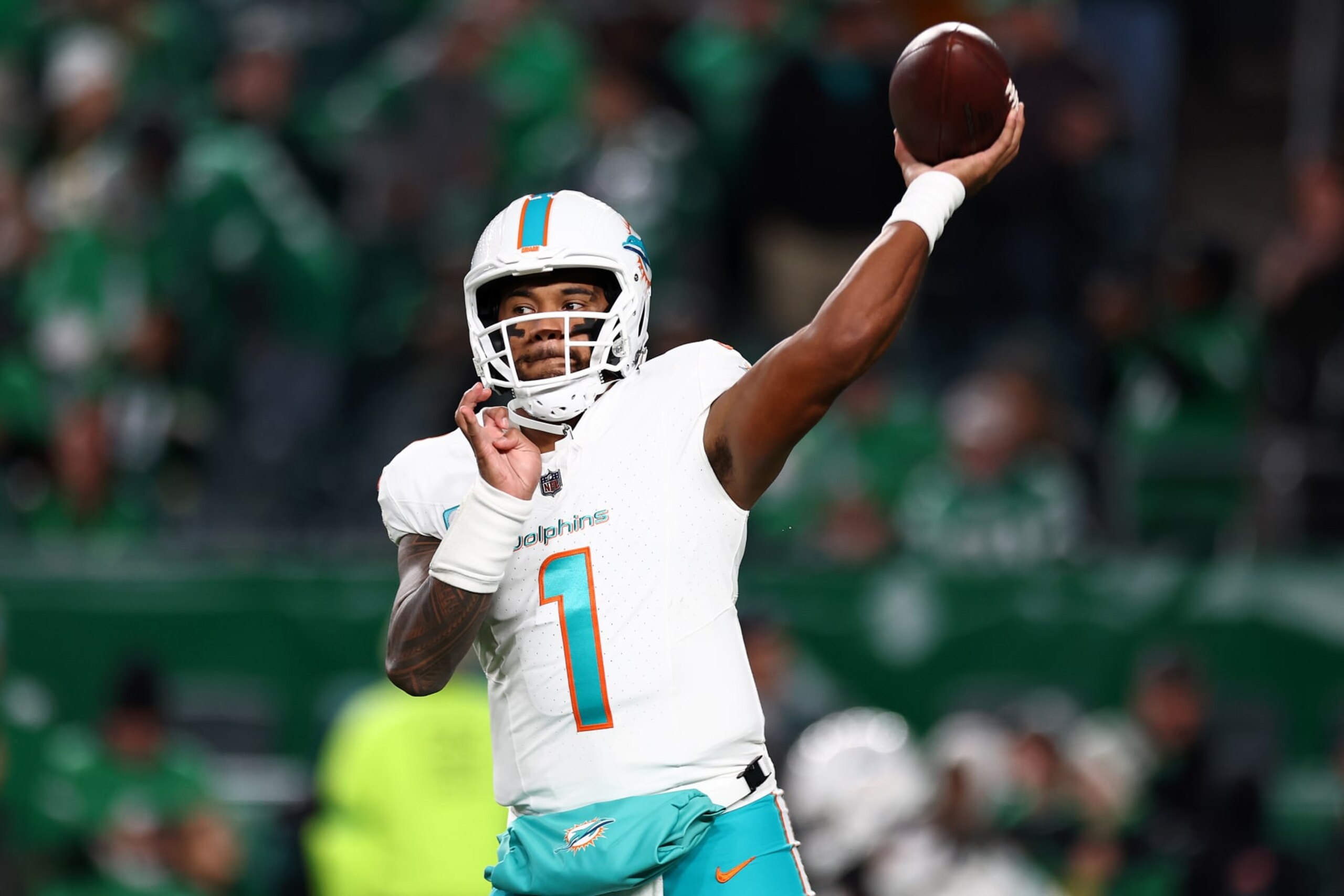 PHILADELPHIA, PENNSYLVANIA - OCTOBER 22: Tua Tagovailoa #1 of the Miami Dolphins warms up prior to a game against the Philadelphia Eagles at Lincoln Financial Field on October 22, 2023 in Philadelphia, Pennsylvania. (Photo by Tim Nwachukwu/Getty Images)