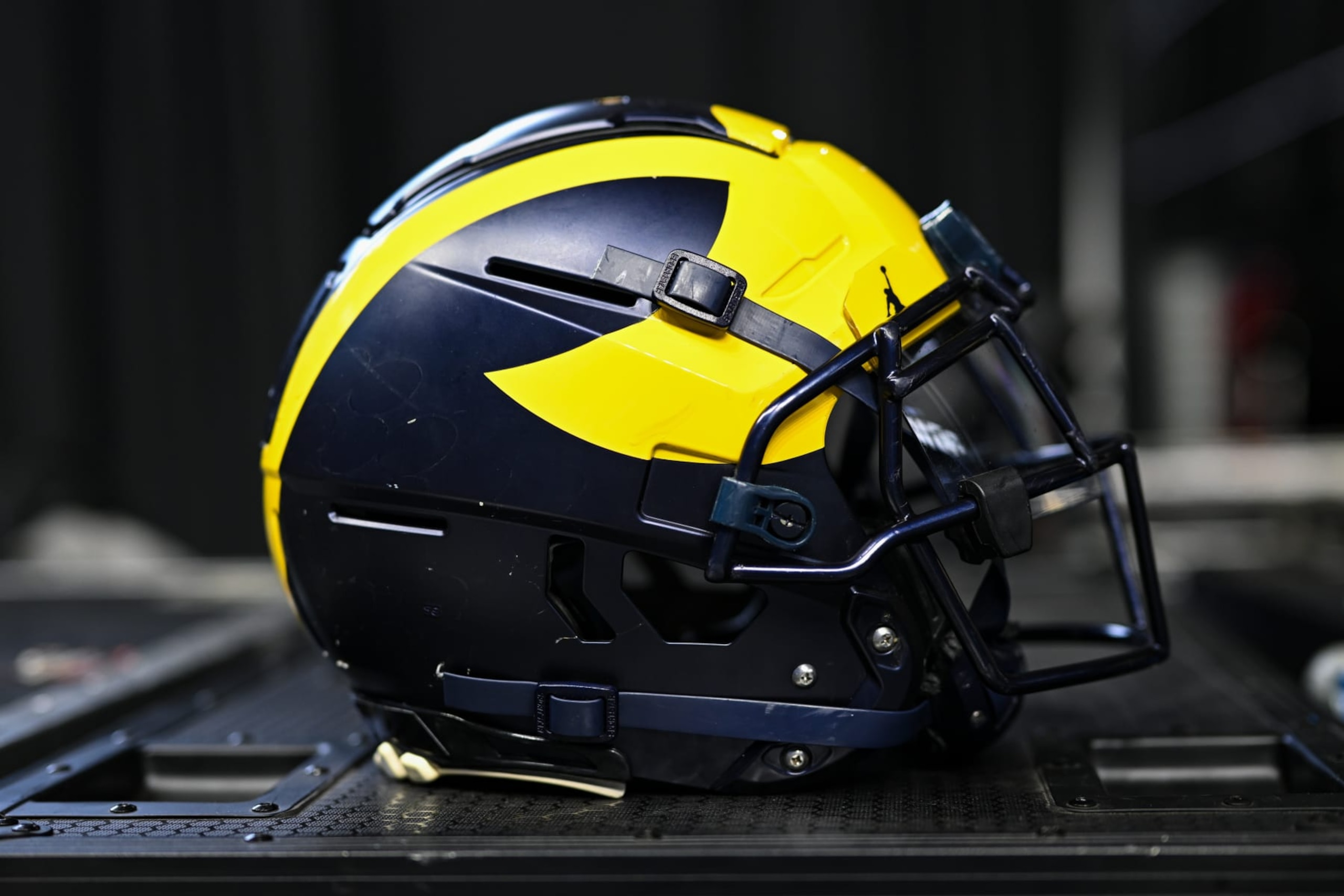 INDIANAPOLIS, IN - JULY 27: A Michigan Wolverines football helmet during the Big Ten Conference Media Days on July 27, 2023 at Lucas Oil Stadium in Indianapolis, IN (Photo by James Black/Icon Sportswire via Getty Images) INDIANAPOLIS, IN - JULY 27: A Michigan Wolverines football helmet during the Big Ten Conference Media Days on July 27, 2023 at Lucas Oil Stadium in Indianapolis, IN (Photo by James Black/Icon Sportswire via Getty Images)