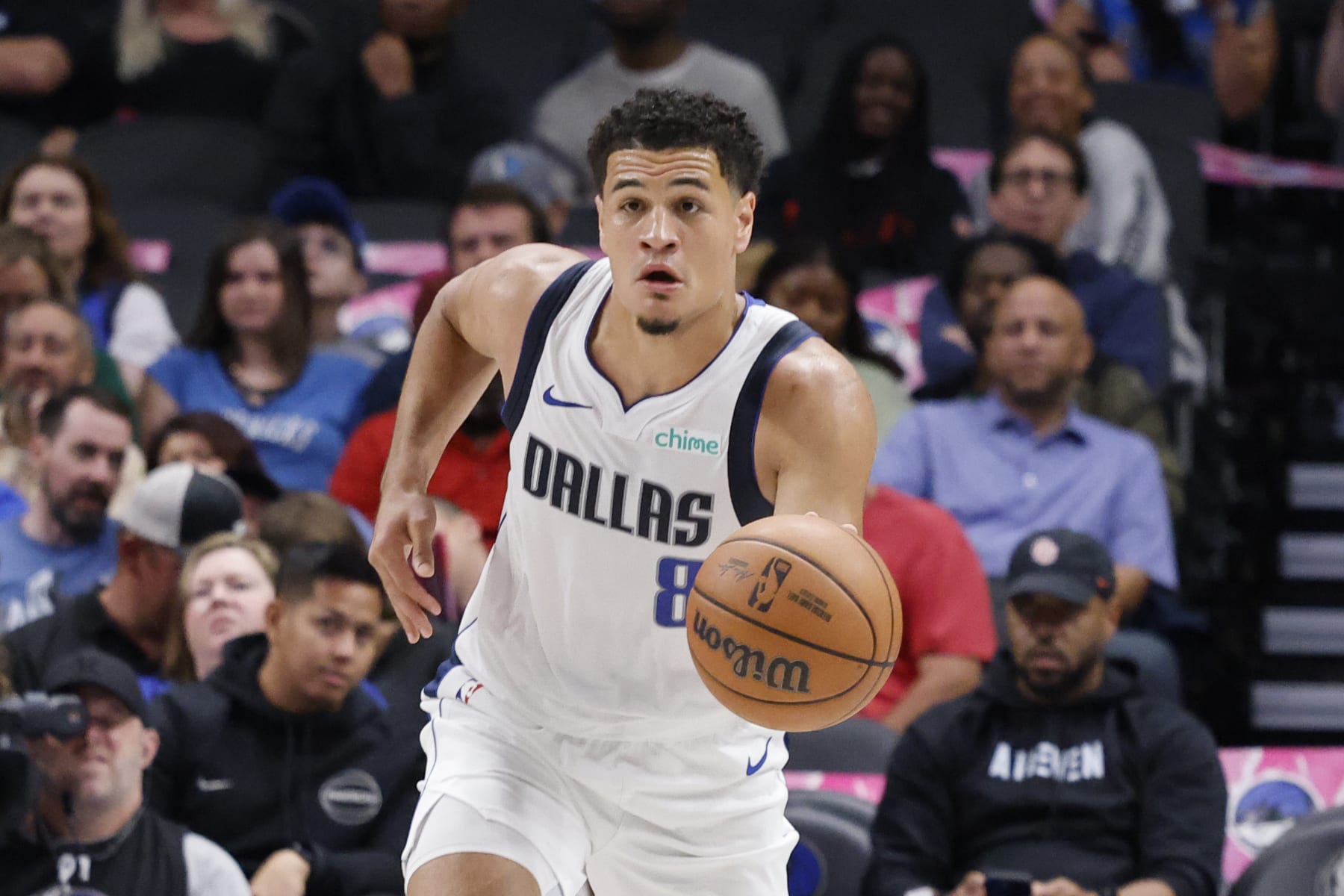 Dallas Mavericks guard Josh Green (8) advances the ball during the second half of an NBA preseason basketball game in Dallas, Friday, Oct. 20, 2023. (AP Photo/Michael Ainsworth)