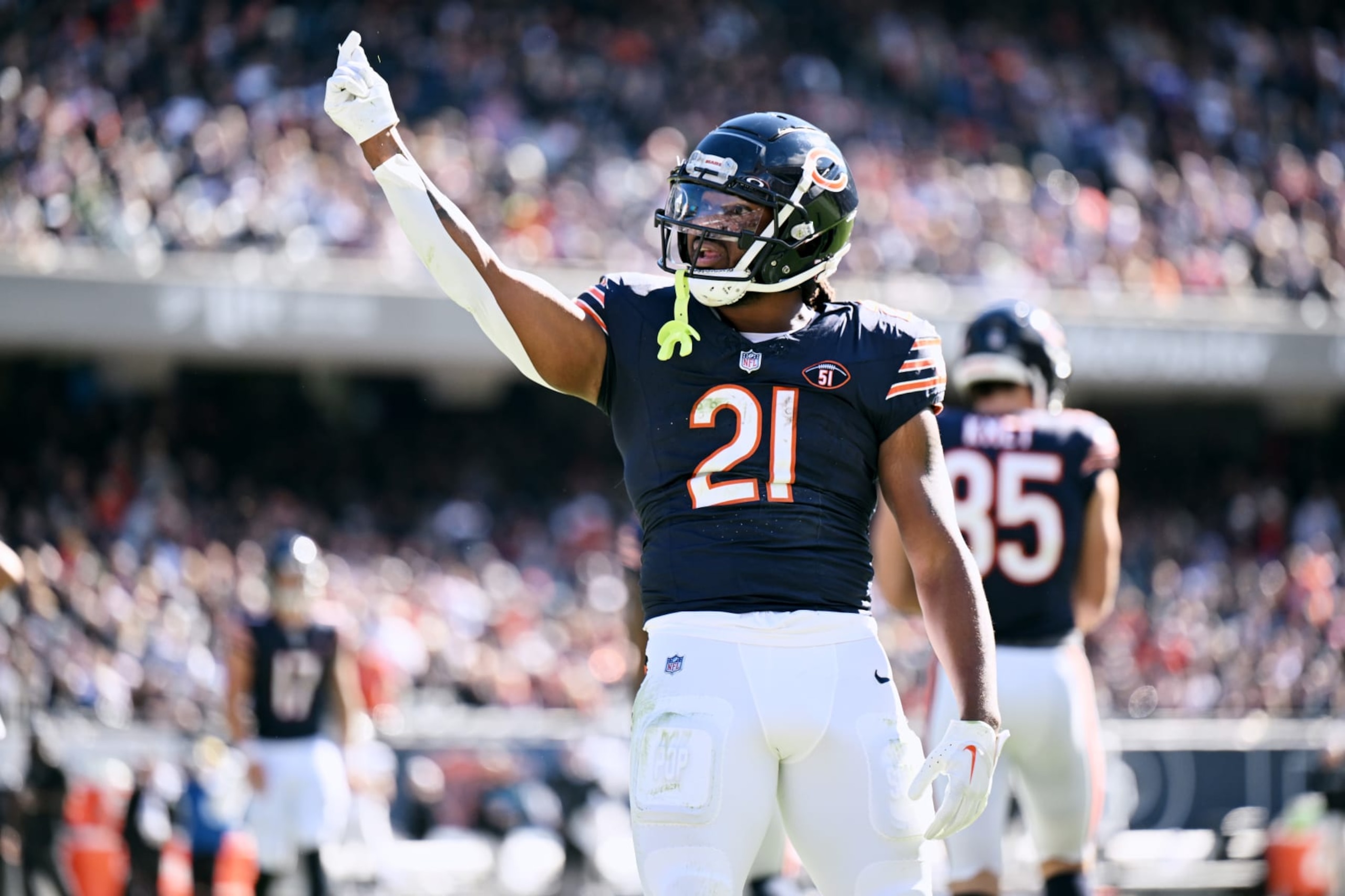 CHICAGO, ILLINOIS - OCTOBER 22: D'Onta Foreman #21 of the Chicago Bears reacts during the first quarter against the Las Vegas Raiders at Soldier Field on October 22, 2023 in Chicago, Illinois. (Photo by Quinn Harris/Getty Images)