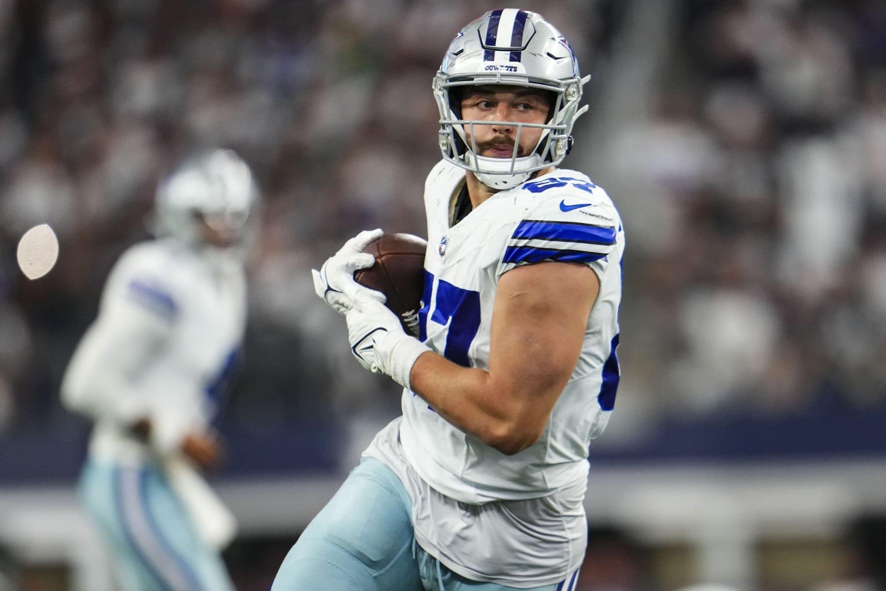 ARLINGTON, TX - SEPTEMBER 17: Jake Ferguson #87 of the Dallas Cowboys runs the ball during a football game at AT&T Stadium on September 17, 2023 in Arlington, Texas. (Photo by Cooper Neill/Getty Images)