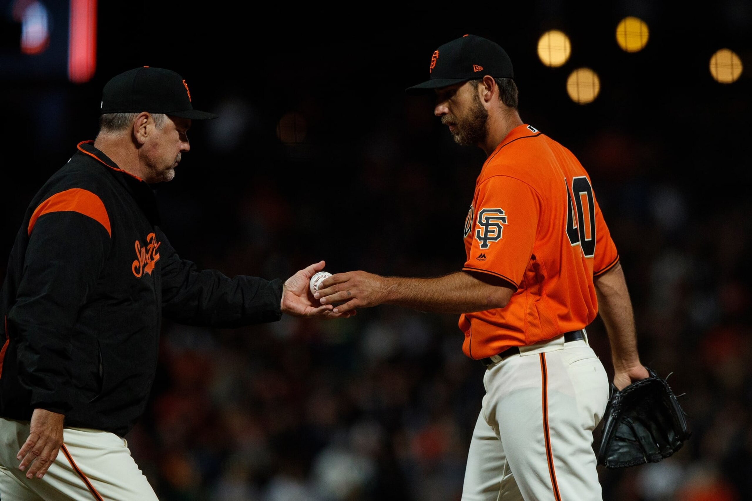 SAN FRANCISCO, CA - JULY 13: Madison Bumgarner #40 of the San Francisco Giants is relieved by manager Bruce Bochy #15 during the seventh inning against the Oakland Athletics at AT&T Park on July 13, 2018 in San Francisco, California. The San Francisco Giants defeated the Oakland Athletics 7-1. (Photo by Jason O. Watson/Getty Images)