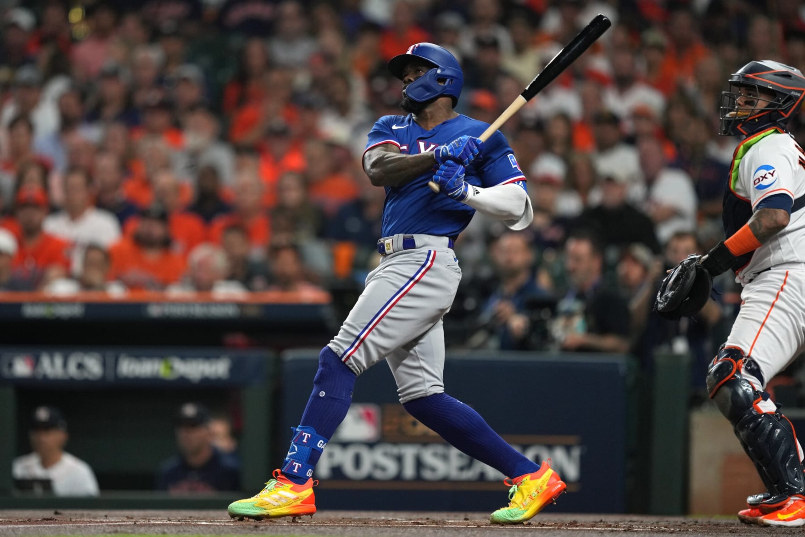 HOUSTON, TX - OCTOBER 23: Adolis García #53 of the Texas Rangers hits an RBI single in the first inning during Game 7 of the ALCS between the Texas Rangers and the Houston Astros at Minute Maid Park on Monday, October 23, 2023 in Houston, Texas. (Photo by Alex Bierens de Haan/MLB Photos via Getty Images)