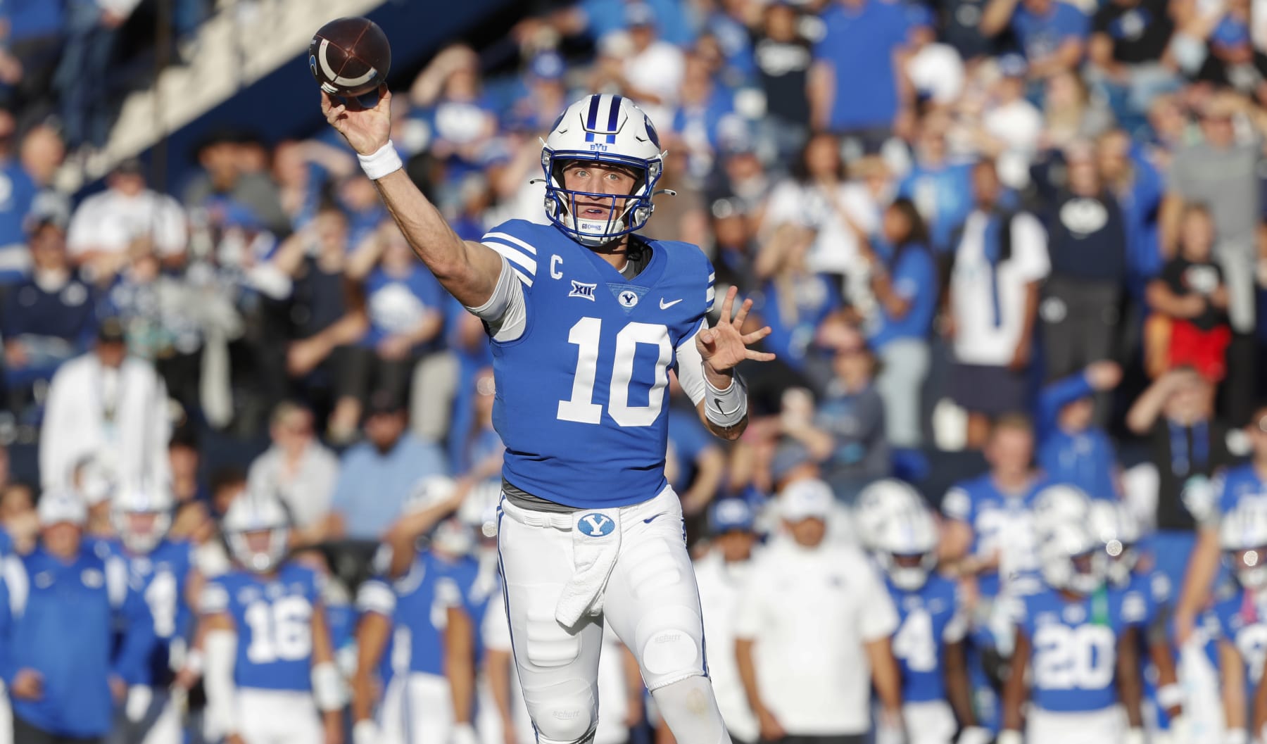PROVO, UT - OCTOBER 21: Kedon Slovis #10 of the Brigham Young Cougars throws a touchdown pass against the Texas Tech Raiders during the first half of their game at LaVell Edwards Stadium on October 21, 2023 in Provo, Utah. (Photo by Chris Gardner/Getty Images)
