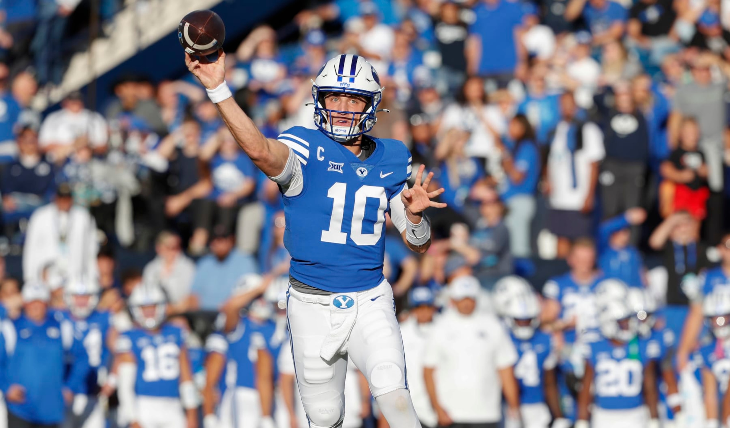 PROVO, UT - OCTOBER 21: Kedon Slovis #10 of the Brigham Young Cougars throws a touchdown pass against the Texas Tech Raiders during the first half of their game at LaVell Edwards Stadium on October 21, 2023 in Provo, Utah. (Photo by Chris Gardner/Getty Images)