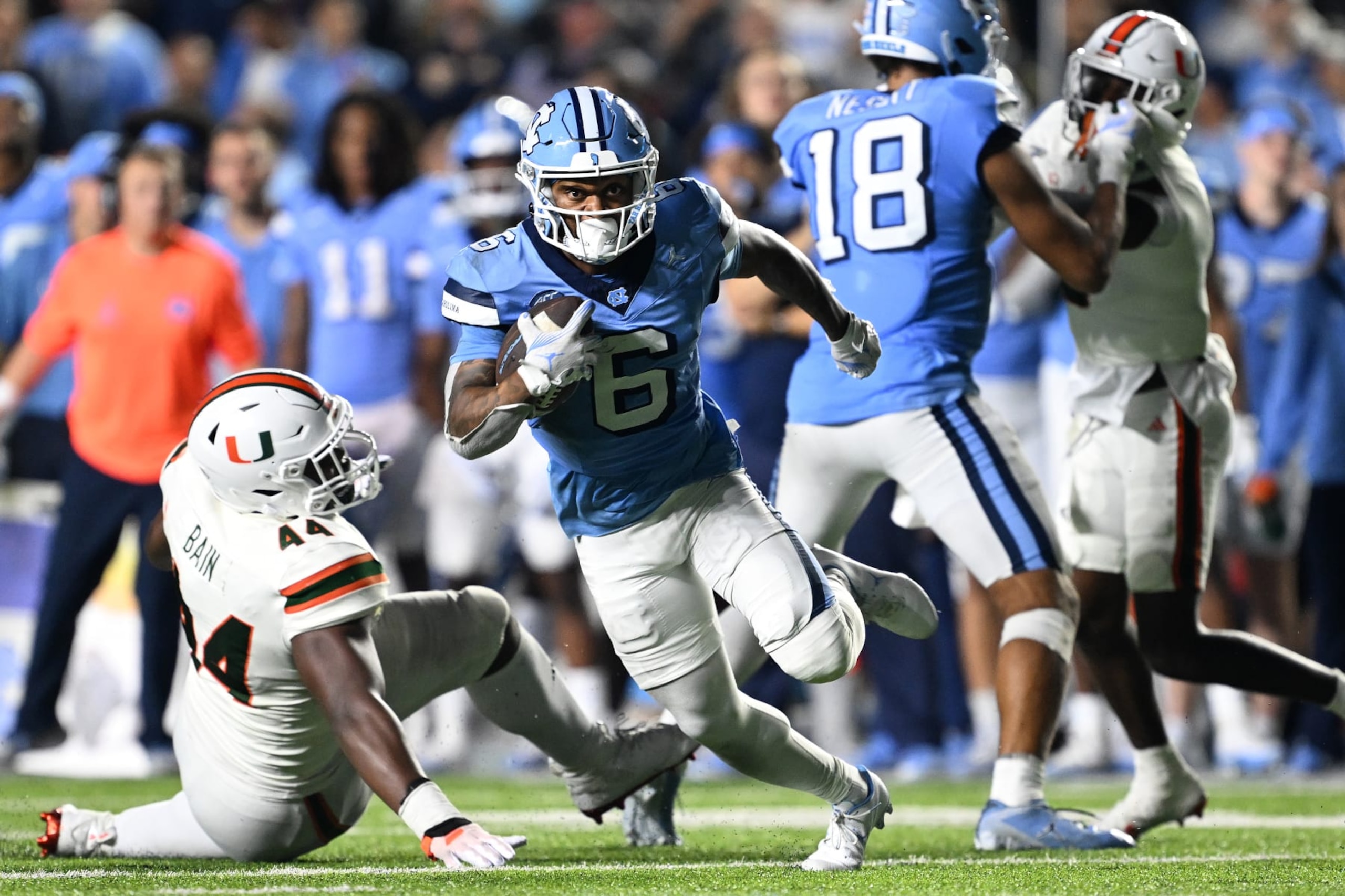 CHAPEL HILL, NORTH CAROLINA - OCTOBER 14: Nate McCollum #6 of the North Carolina Tar Heels runs the ball after making a catch Miami Hurricanes during their game at Kenan Memorial Stadium on October 14, 2023 in Chapel Hill, North Carolina. The Tar Heels won 41-31. (Photo by Grant Halverson/Getty Images)