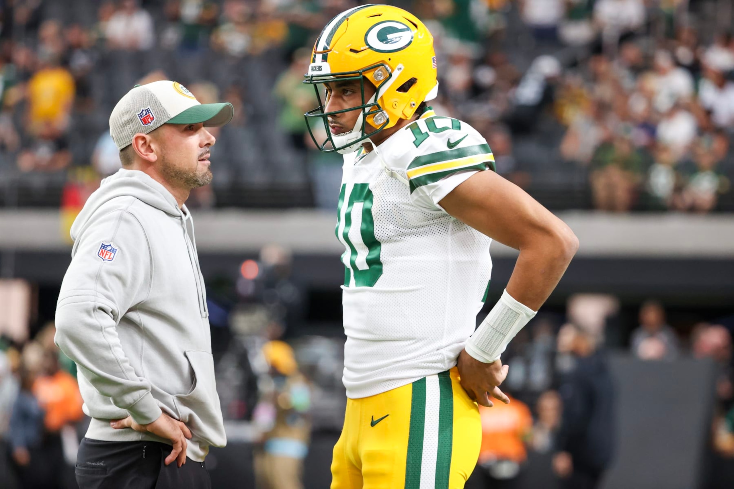 LAS VEGAS, NEVADA - OCTOBER 09: Head coach Matt LaFleur of the Green Bay Packers talks to Jordan Love #10 of the Green Bay Packers prior to a game against the Las Vegas Raiders at Allegiant Stadium on October 09, 2023 in Las Vegas, Nevada. (Photo by Ian Maule/Getty Images)