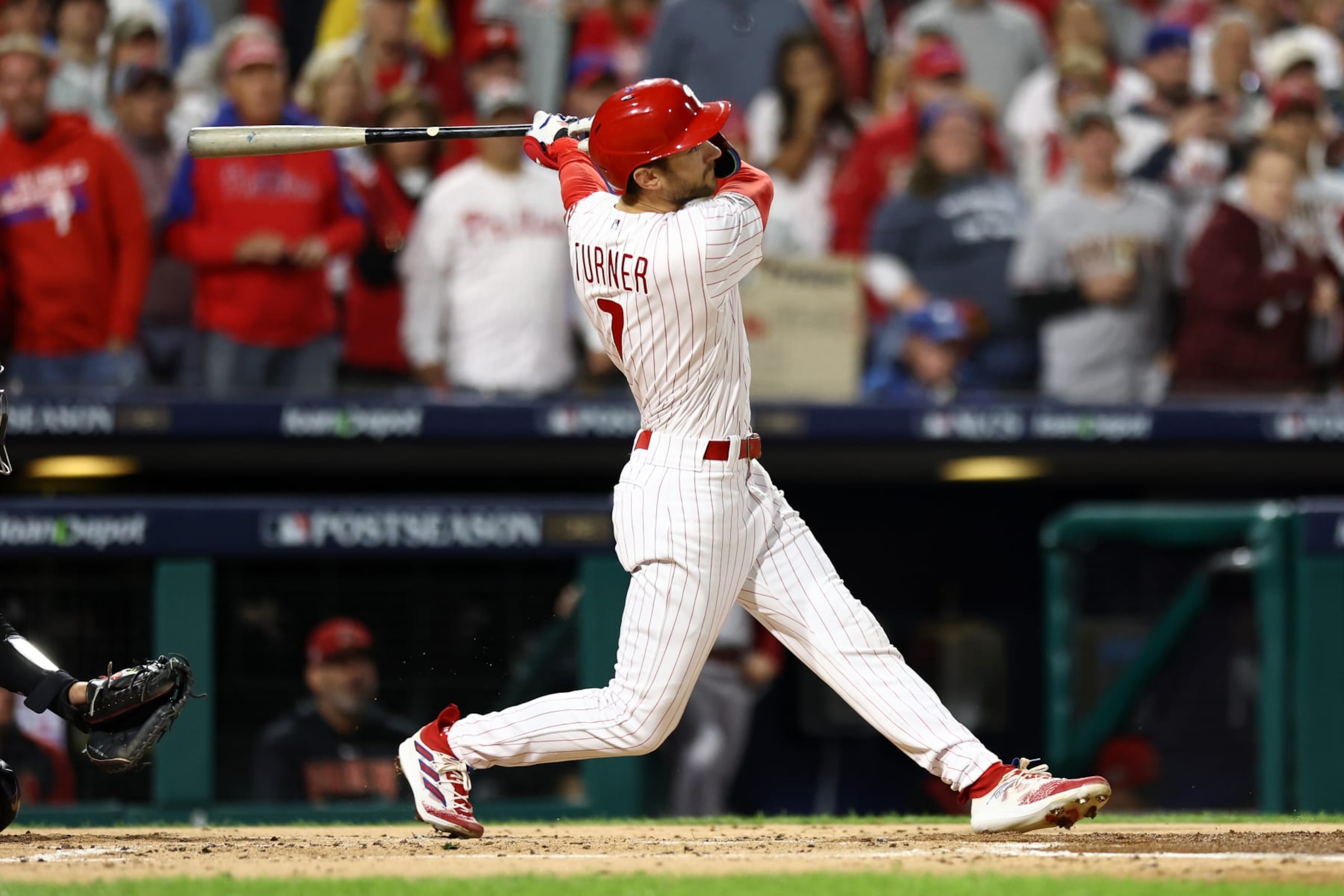 PHILADELPHIA, PENNSYLVANIA - OCTOBER 17: Trea Turner #7 of the Philadelphia Phillies watches his first inning solo home run against the Arizona Diamondbacks during Game Two of the Championship Series at Citizens Bank Park on October 17, 2023 in Philadelphia, Pennsylvania. (Photo by Tim Nwachukwu/Getty Images)