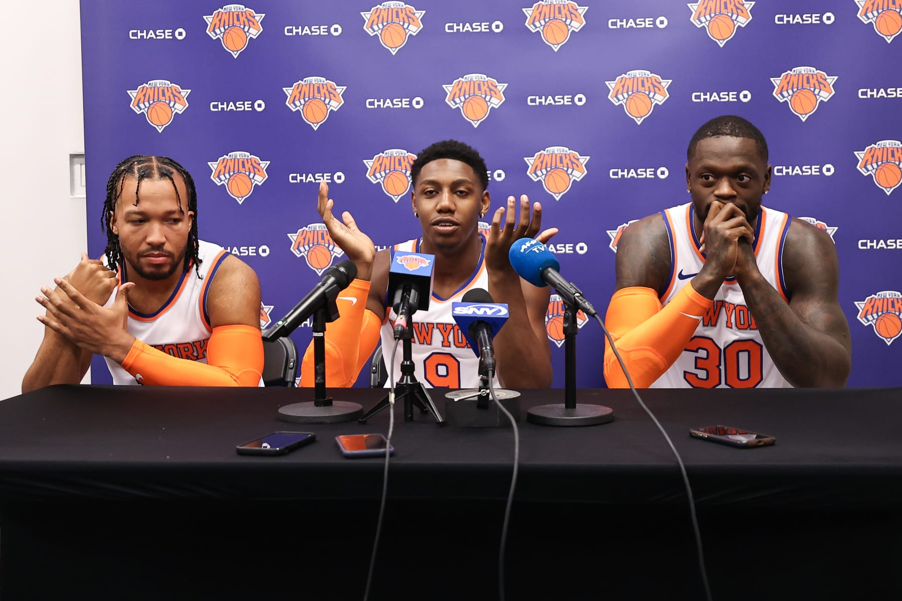 TARRYTOWN, NEW YORK - OCTOBER 02: Jalen Brunson #11, RJ Barrett #9, and Julius Randle #30 speak at a press conference during media day at the MSG Training Center on October 02, 2023 in Tarrytown, New York. NOTE TO USER: User expressly acknowledges and agrees that, by downloading and or using this photograph, User is consenting to the terms and conditions of the Getty Images License Agreement. (Photo by Dustin Satloff/Getty Images)