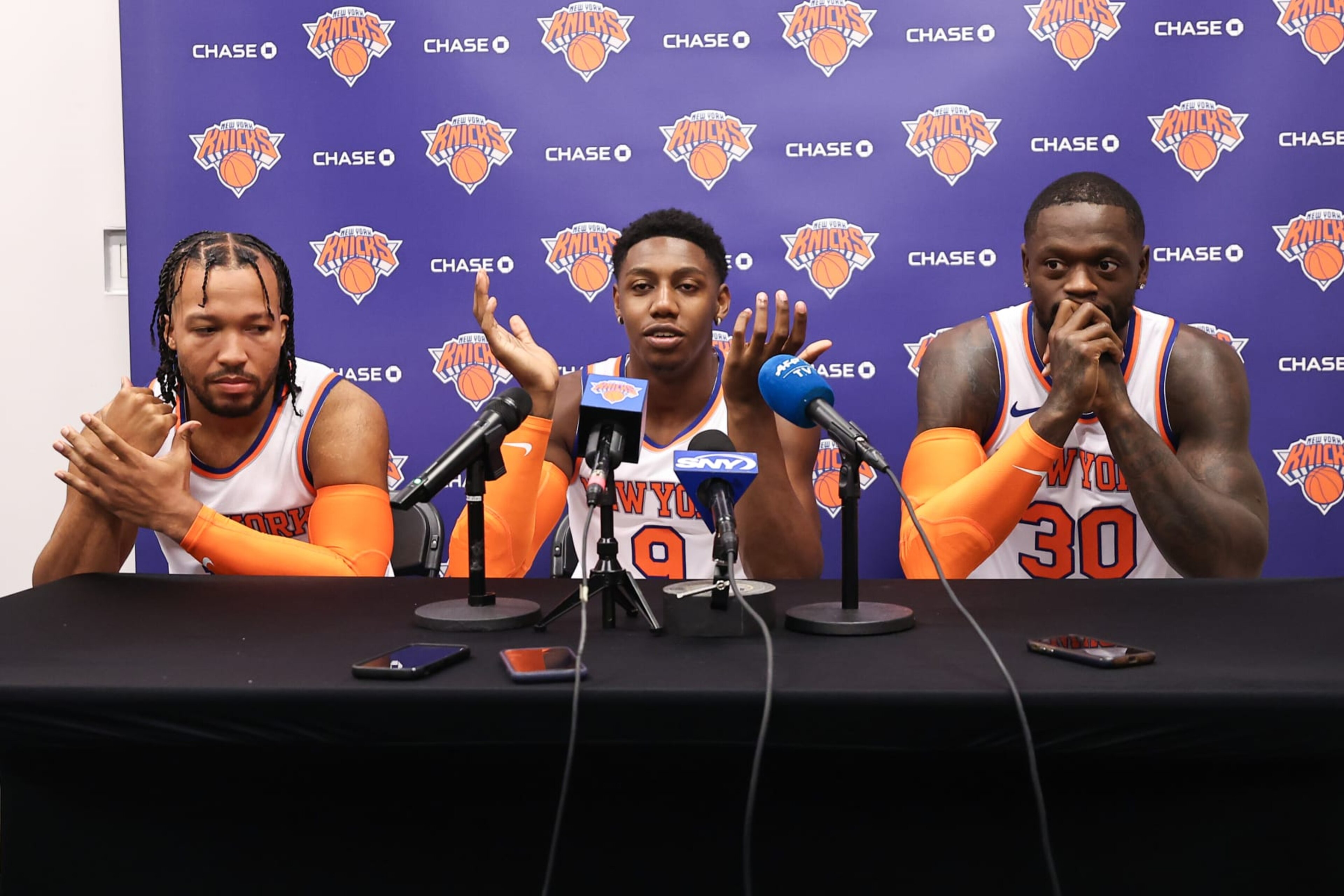 TARRYTOWN, NEW YORK - OCTOBER 02: Jalen Brunson #11, RJ Barrett #9, and Julius Randle #30 speak at a press conference during media day at the MSG Training Center on October 02, 2023 in Tarrytown, New York. NOTE TO USER: User expressly acknowledges and agrees that, by downloading and or using this photograph, User is consenting to the terms and conditions of the Getty Images License Agreement. (Photo by Dustin Satloff/Getty Images)