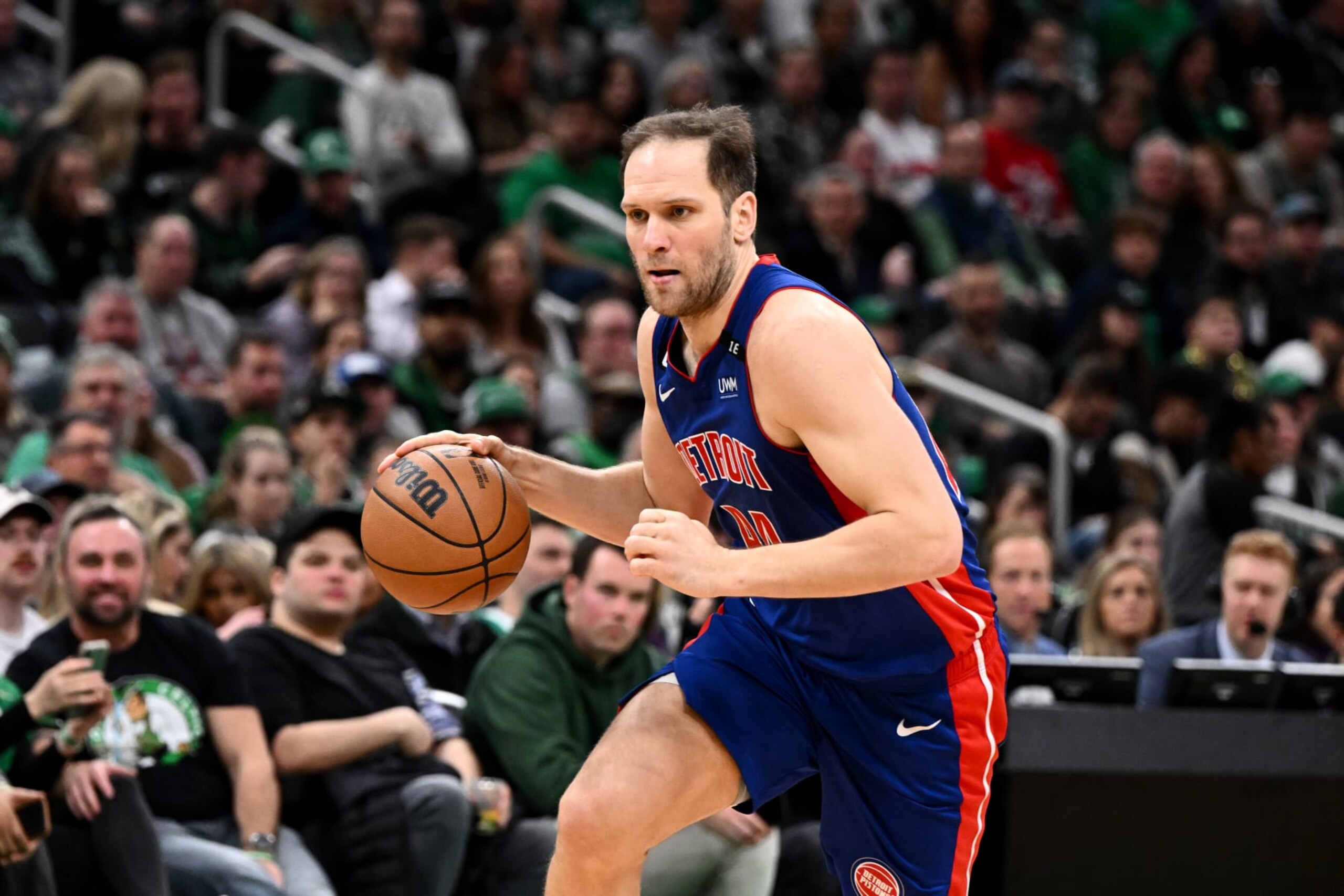 BOSTON, MASSACHUSETTS - FEBRUARY 15: Bojan Bogdanovic #44 of the Detroit Pistons dribbles the ball against the Boston Celtics during the fourth quarter at the TD Garden on February 15, 2023 in Boston, Massachusetts. NOTE TO USER: User expressly acknowledges and agrees that, by downloading and or using this photograph, User is consenting to the terms and conditions of the Getty Images License Agreement. (Photo by Brian Fluharty/Getty Images)