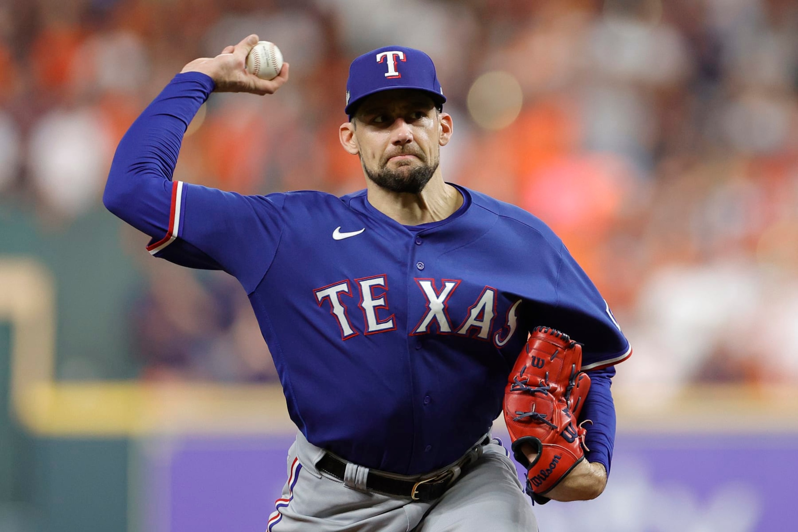 HOUSTON, TEXAS - OCTOBER 22: Nathan Eovaldi #17 of the Texas Rangers throws a pitch against the Houston Astros during the first inning in Game Six of the American League Championship Series at Minute Maid Park on October 22, 2023 in Houston, Texas. (Photo by Carmen Mandato/Getty Images)