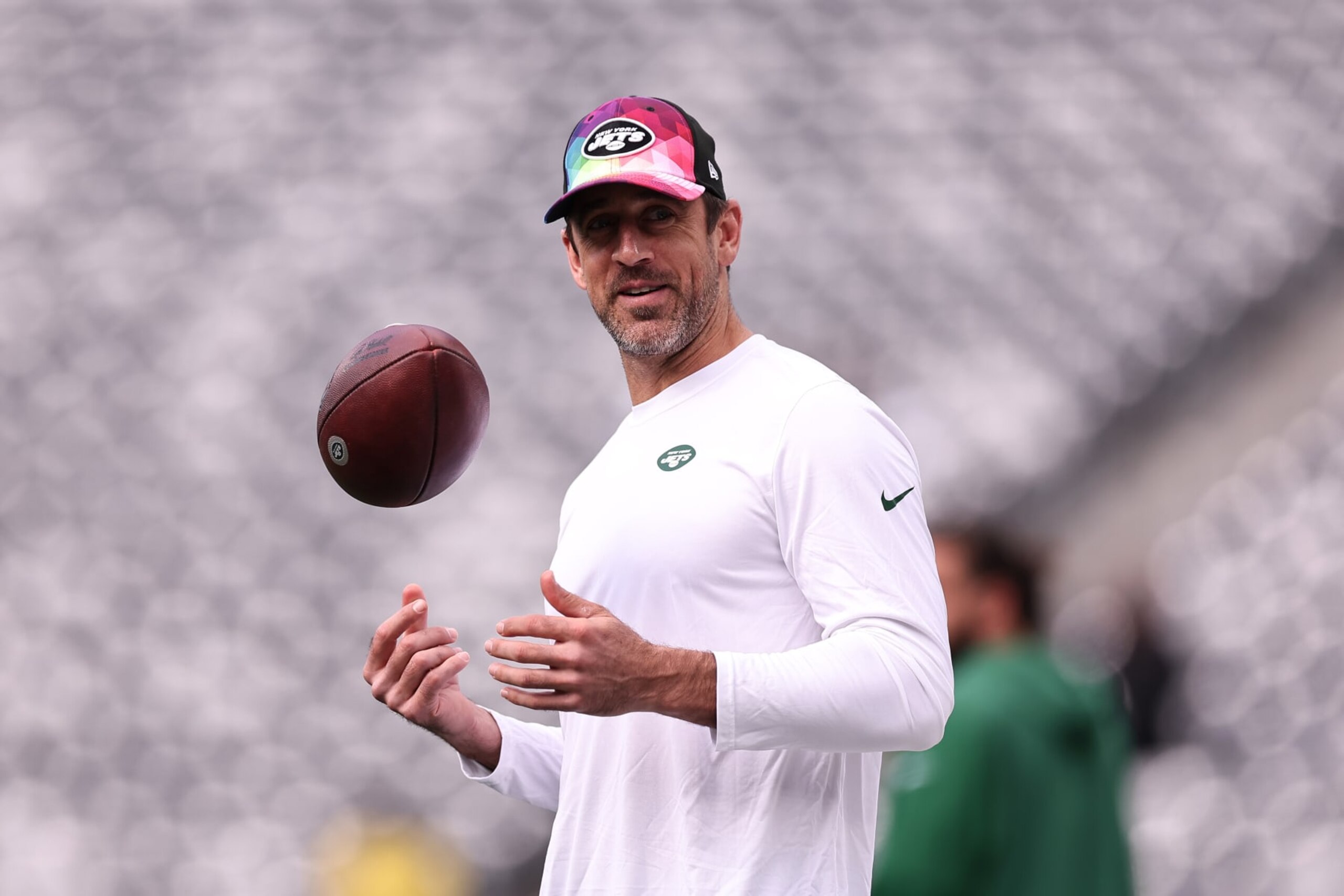 EAST RUTHERFORD, NEW JERSEY - OCTOBER 15: Aaron Rodgers #8 of the New York Jets looks on prior to the game against the Philadelphia Eagles at MetLife Stadium on October 15, 2023 in East Rutherford, New Jersey. (Photo by Dustin Satloff/Getty Images)