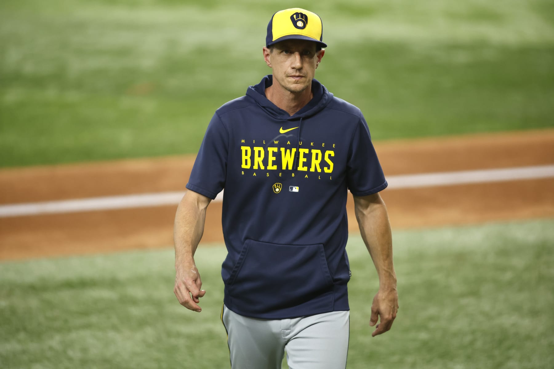 ARLINGTON, TEXAS - AUGUST 19: Craig Counsell #30 of the Milwaukee Brewers walks off the field in the sixth inning against the Texas Rangers at Globe Life Field on August 19, 2023 in Arlington, Texas. (Photo by Tim Heitman/Getty Images)