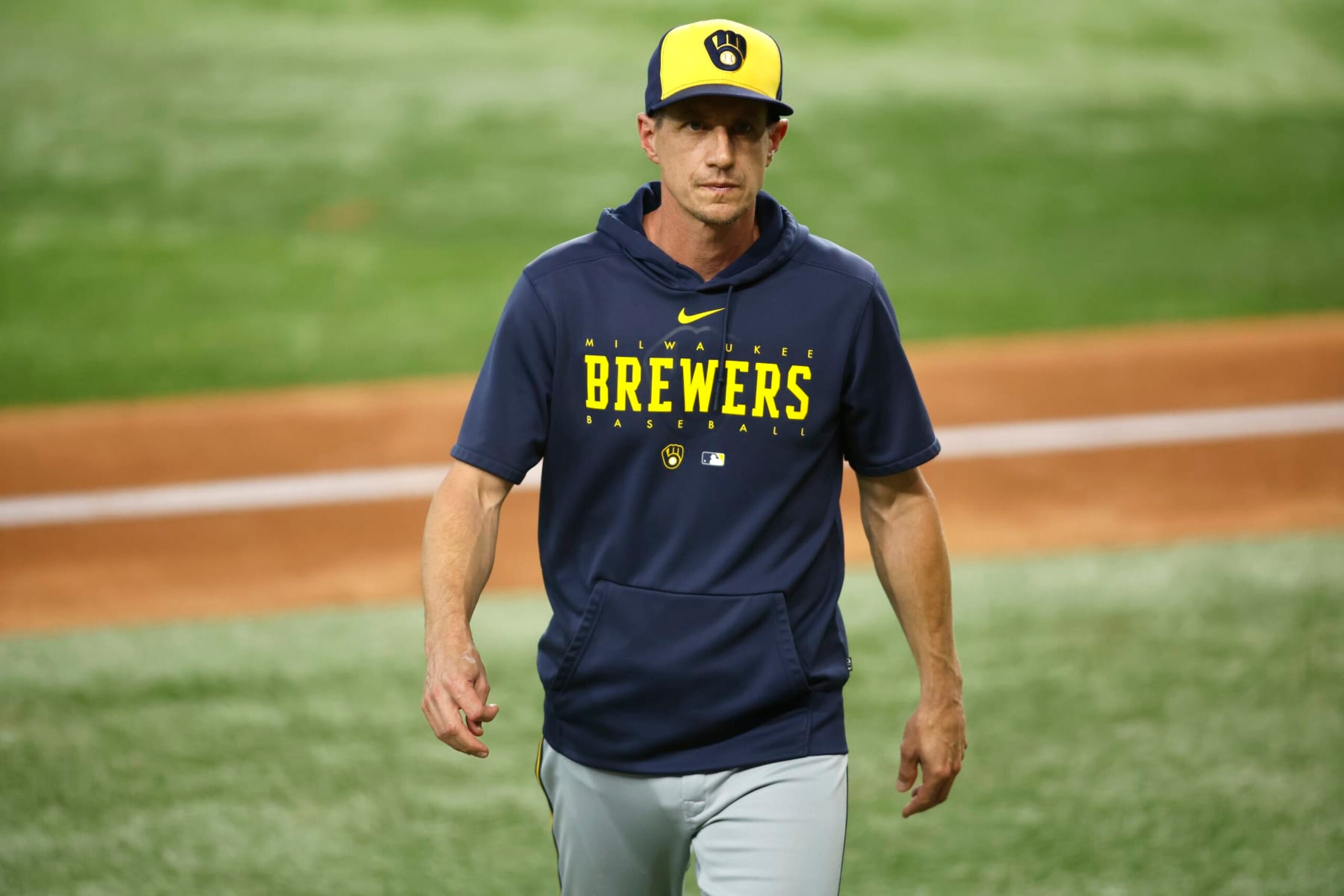 ARLINGTON, TEXAS - AUGUST 19: Craig Counsell #30 of the Milwaukee Brewers walks off the field in the sixth inning against the Texas Rangers at Globe Life Field on August 19, 2023 in Arlington, Texas. (Photo by Tim Heitman/Getty Images)