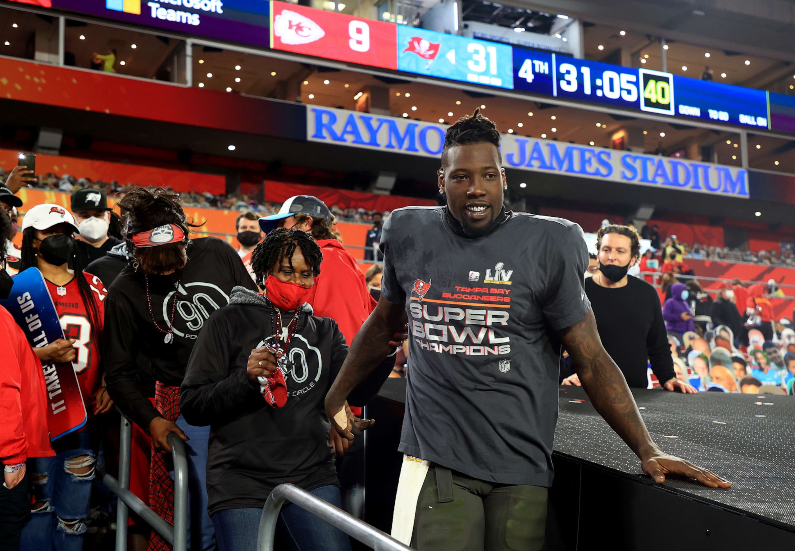 TAMPA, FLORIDA - FEBRUARY 07: Jason Pierre-Paul #90 of the Tampa Bay Buccaneers celebrates with family after winning Super Bowl LV at Raymond James Stadium on February 07, 2021 in Tampa, Florida. The Buccaneers defeated the Chiefs 31-9. (Photo by Mike Ehrmann/Getty Images) TAMPA, FLORIDA - FEBRUARY 07: Jason Pierre-Paul #90 of the Tampa Bay Buccaneers celebrates with family after winning Super Bowl LV at Raymond James Stadium on February 07, 2021 in Tampa, Florida. The Buccaneers defeated the Chiefs 31-9. (Photo by Mike Ehrmann/Getty Images)