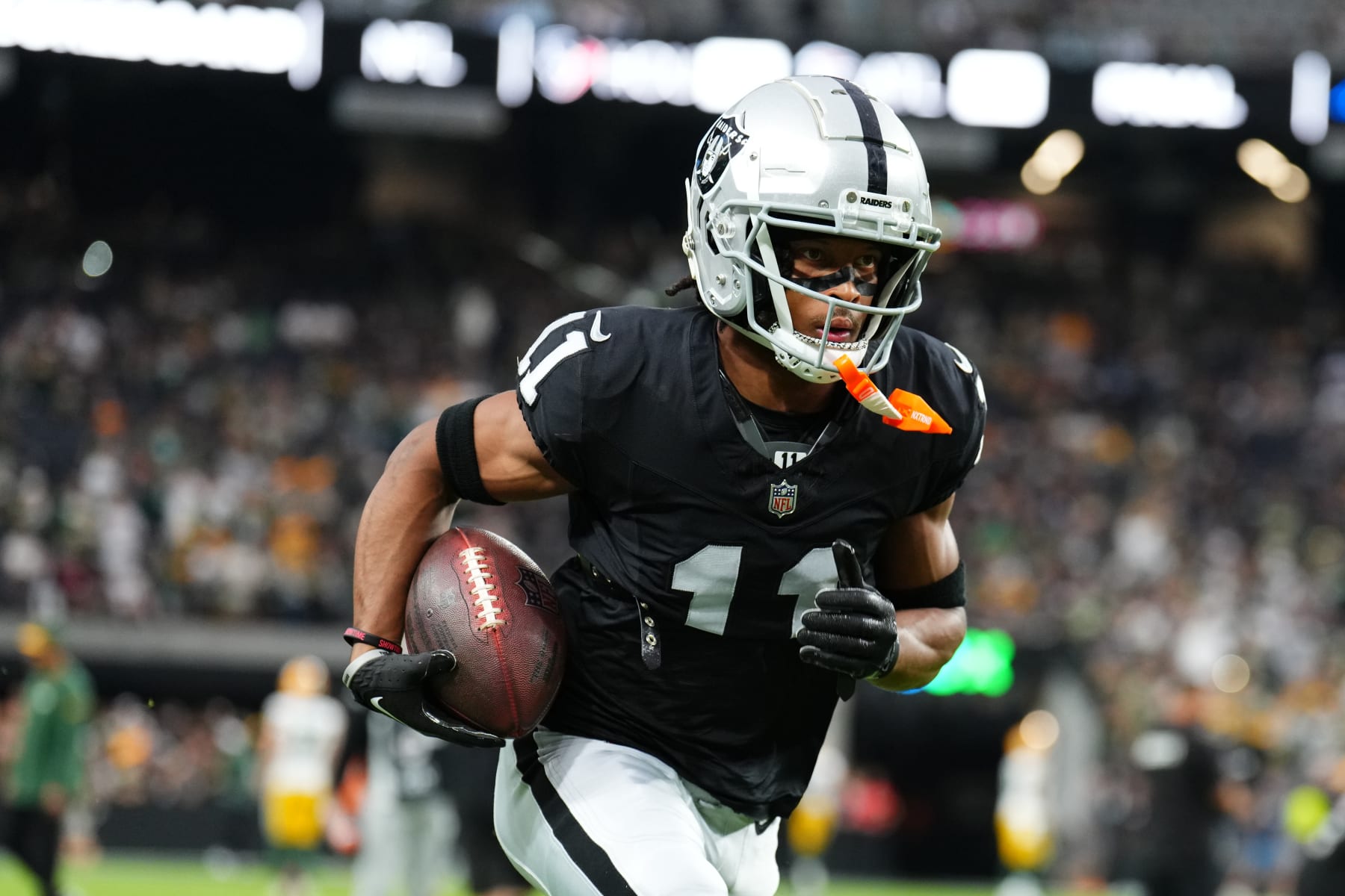 LAS VEGAS, NEVADA - OCTOBER 09: Wide receiver Tre Tucker #11 of the Las Vegas Raiders warms up before a game against the Green Bay Packers at Allegiant Stadium on October 09, 2023 in Las Vegas, Nevada. (Photo by Chris Unger/Getty Images)
